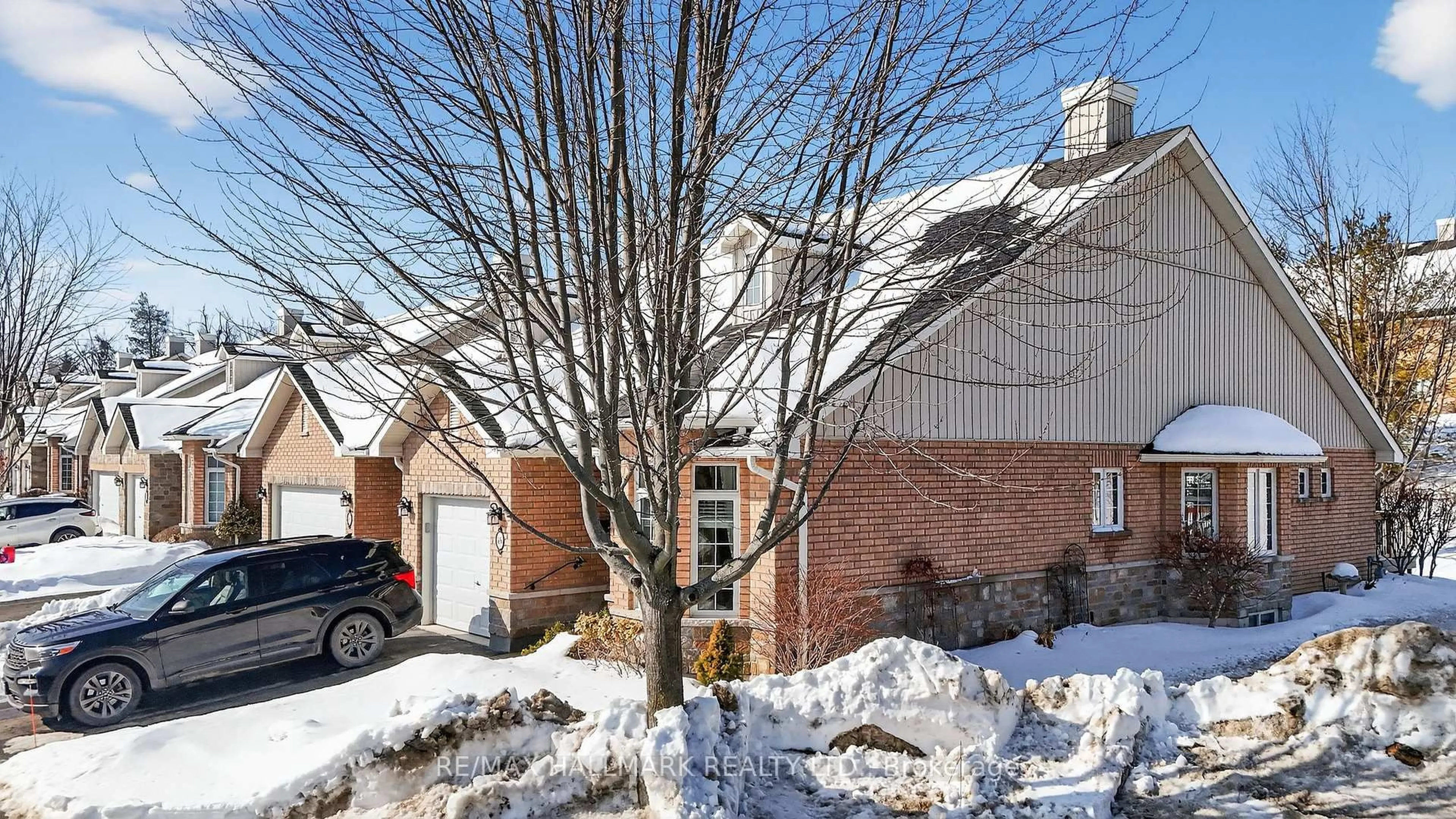 Home with brick exterior material, street for 86 VILLAGE Cres #105, Peterborough Ontario K9J 8S7