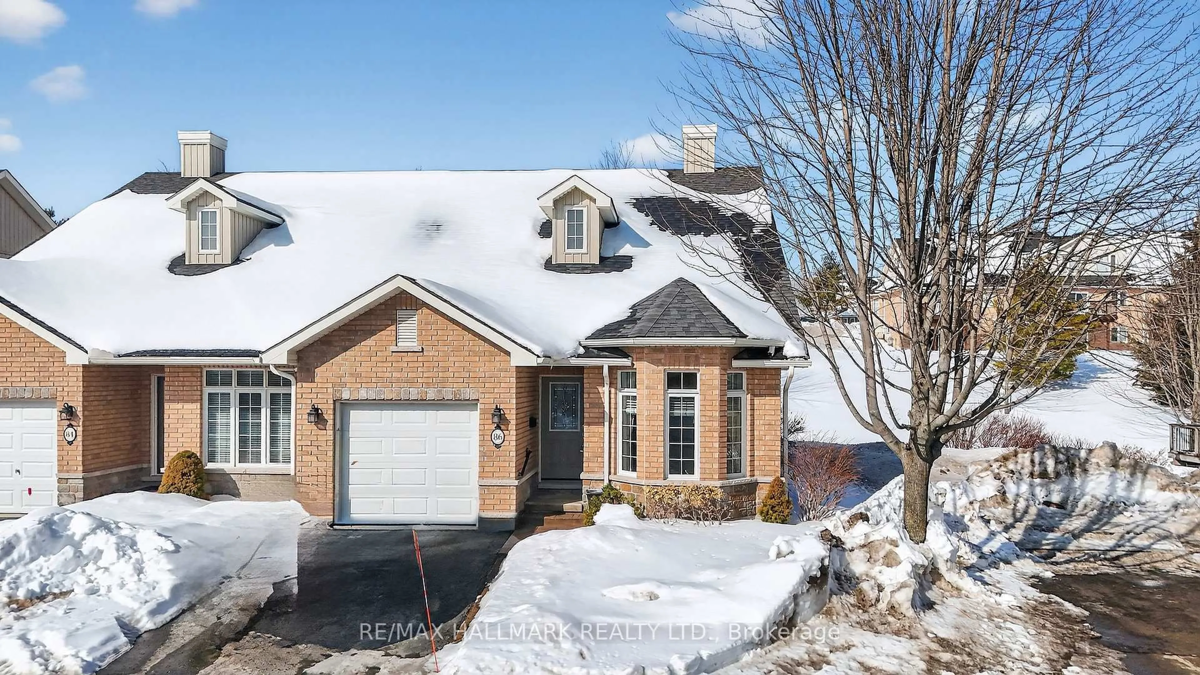 Home with brick exterior material, street for 86 VILLAGE Cres #105, Peterborough Ontario K9J 8S7