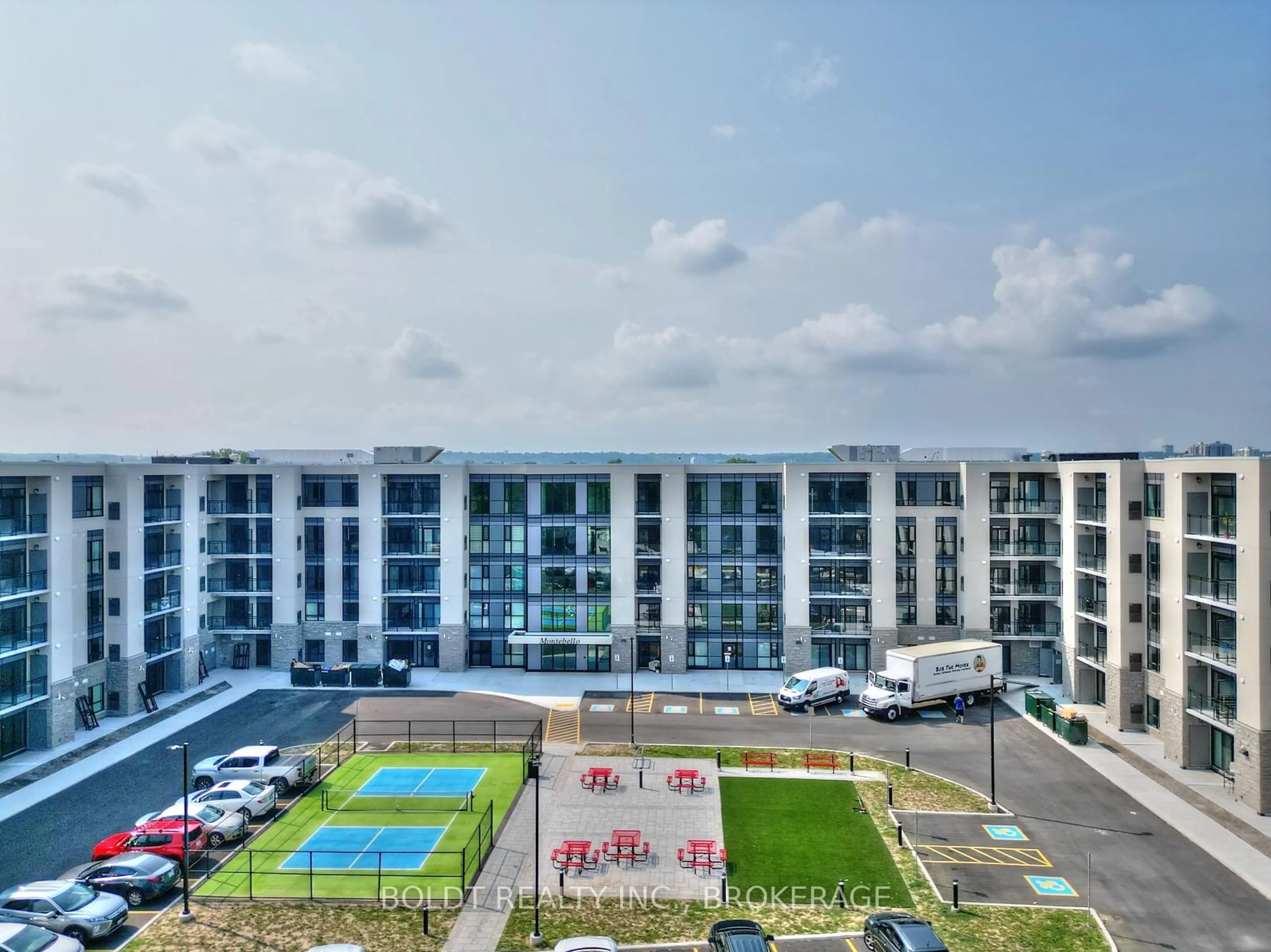 A pic from outside/outdoor area/front of a property/back of a property/a pic from drone, city buildings view from balcony for 50 Herrick Ave #GL 11, St. Catharines Ontario L2P 0G3