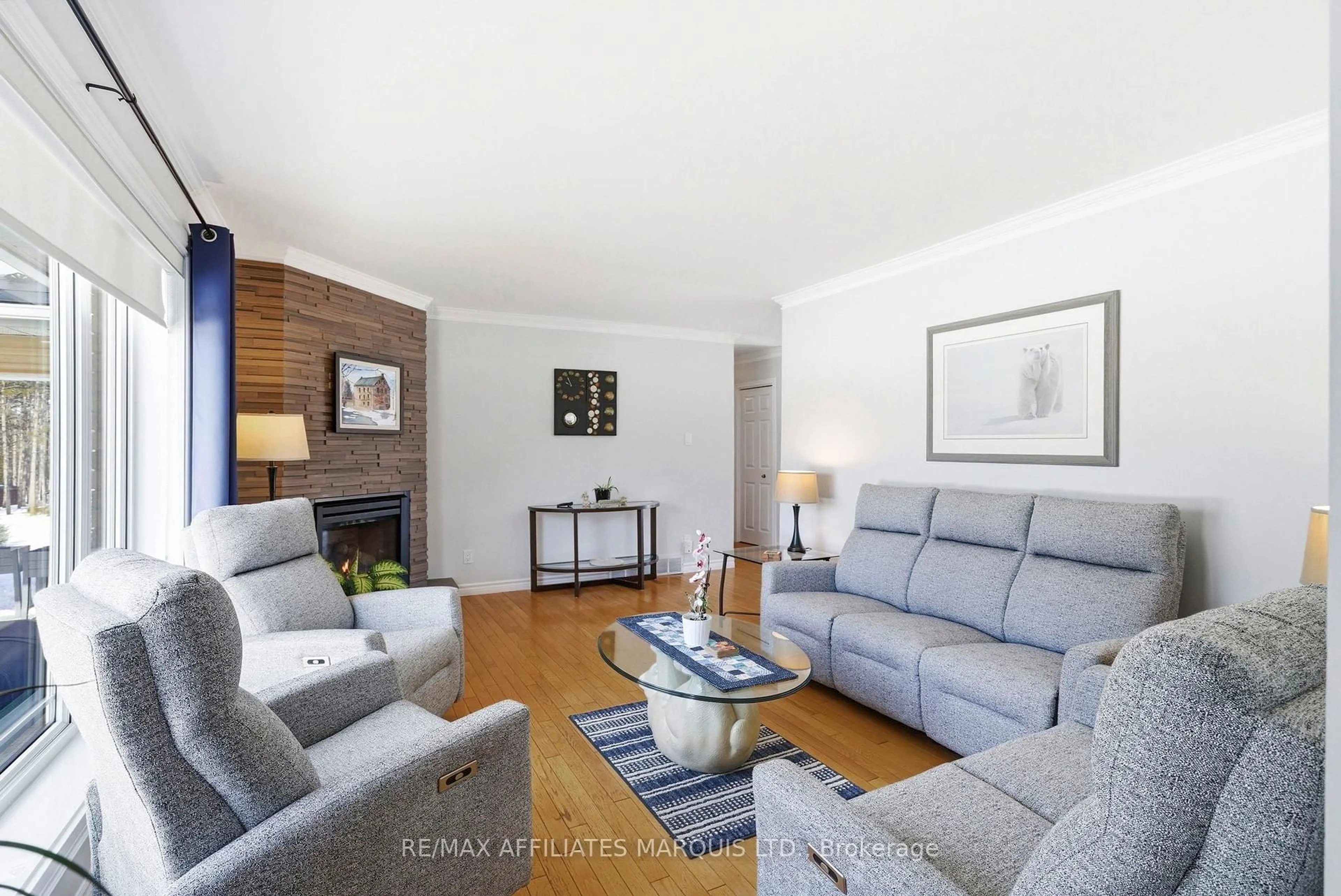 Living room with furniture, wood/laminate floor for 5650 Pinestone Dr, South Glengarry Ontario K0C 2J0