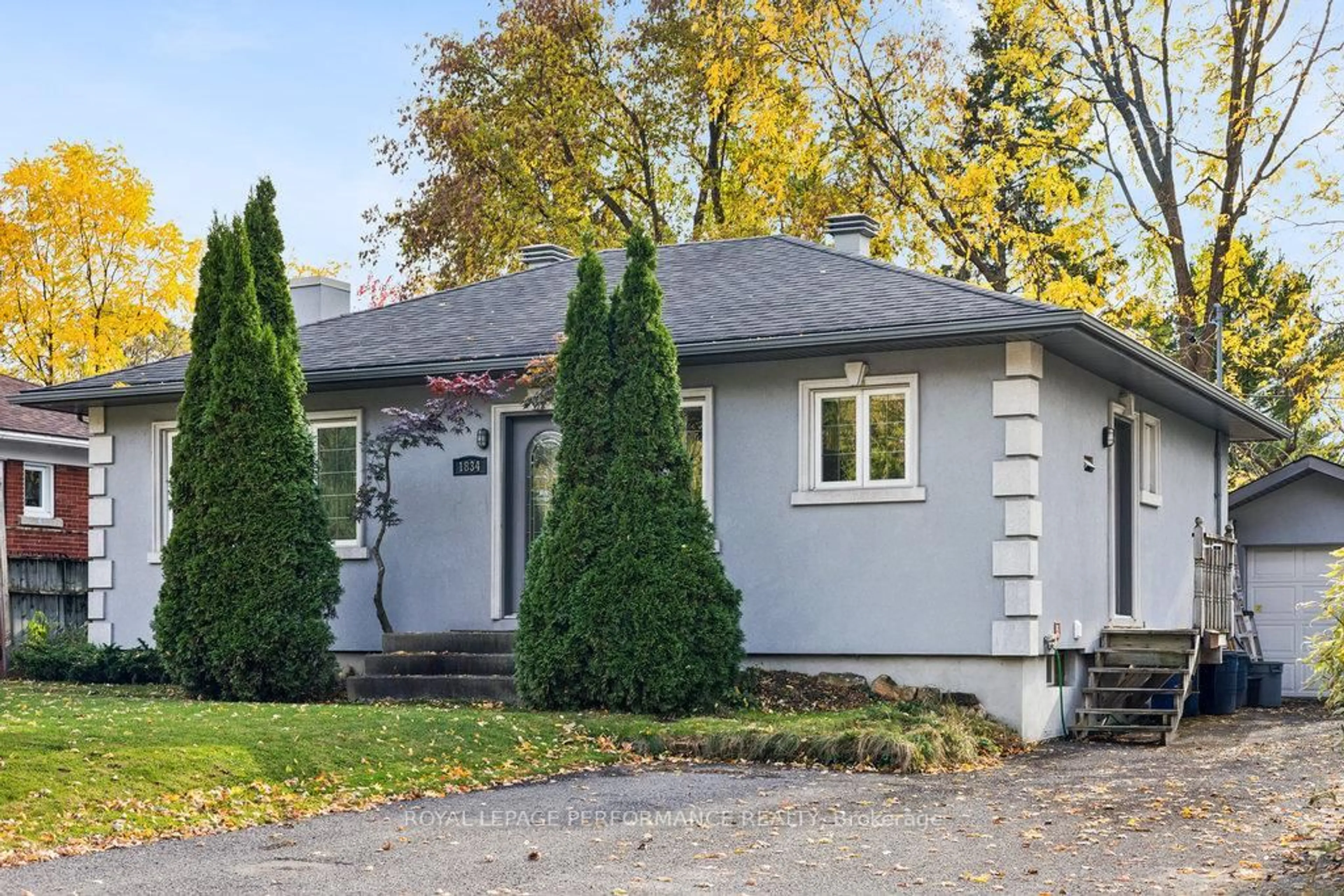 Home with vinyl exterior material, street for 1834 Russell Rd, Ottawa Ontario K1G 1L5