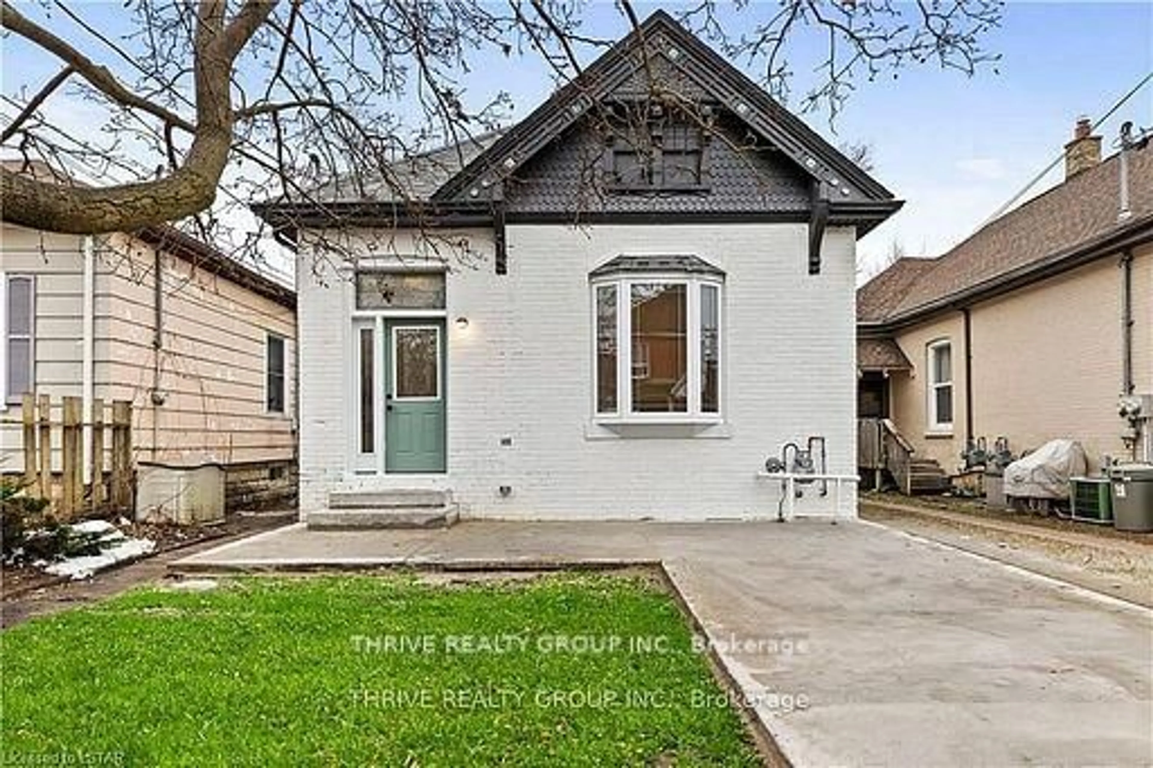 Home with brick exterior material, street for 888 QUEENS Ave, London East Ontario N5W 3H8