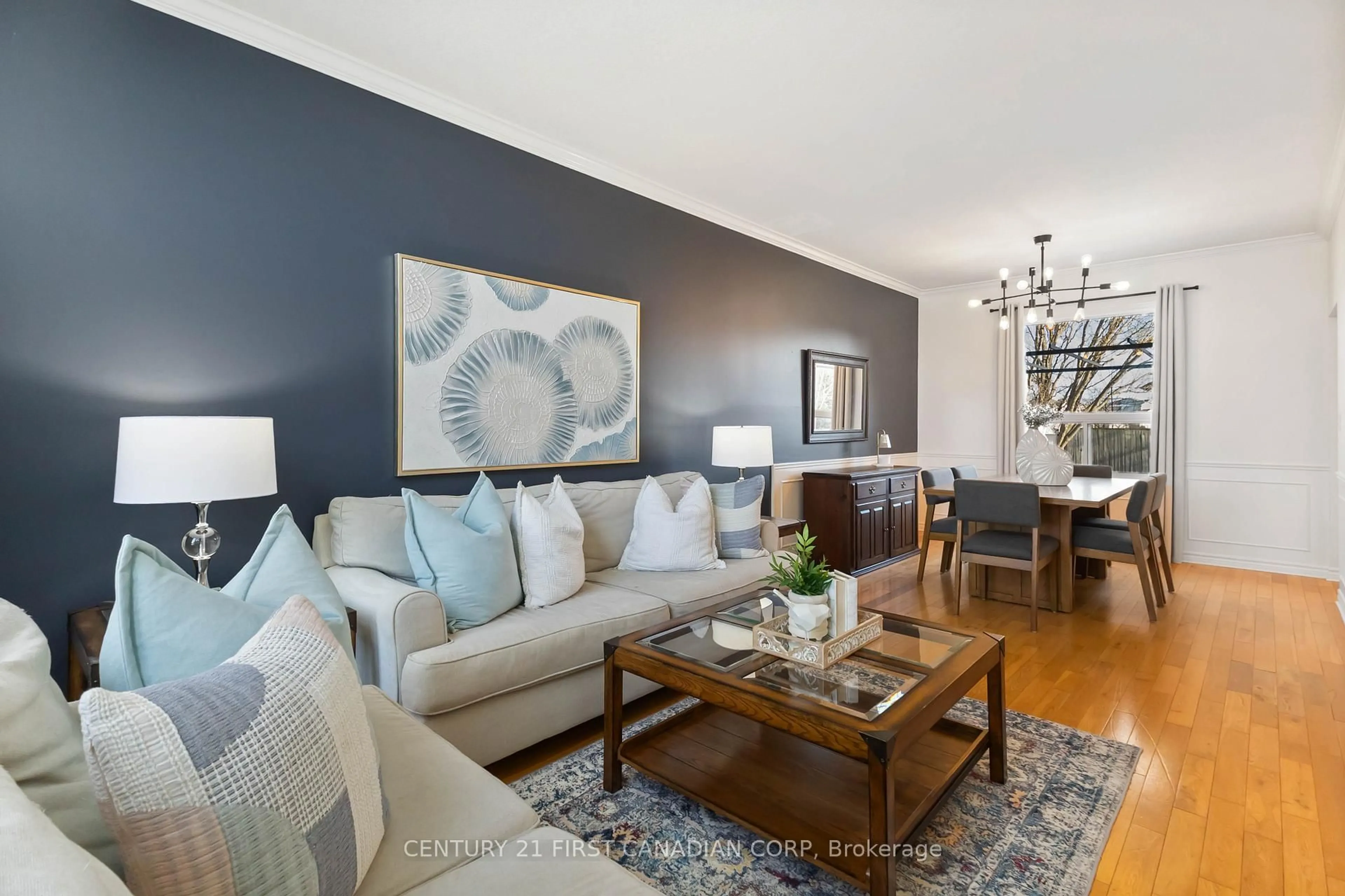 Living room with furniture, wood/laminate floor for 1 Watson Cres, Central Elgin Ontario N5P 4P5