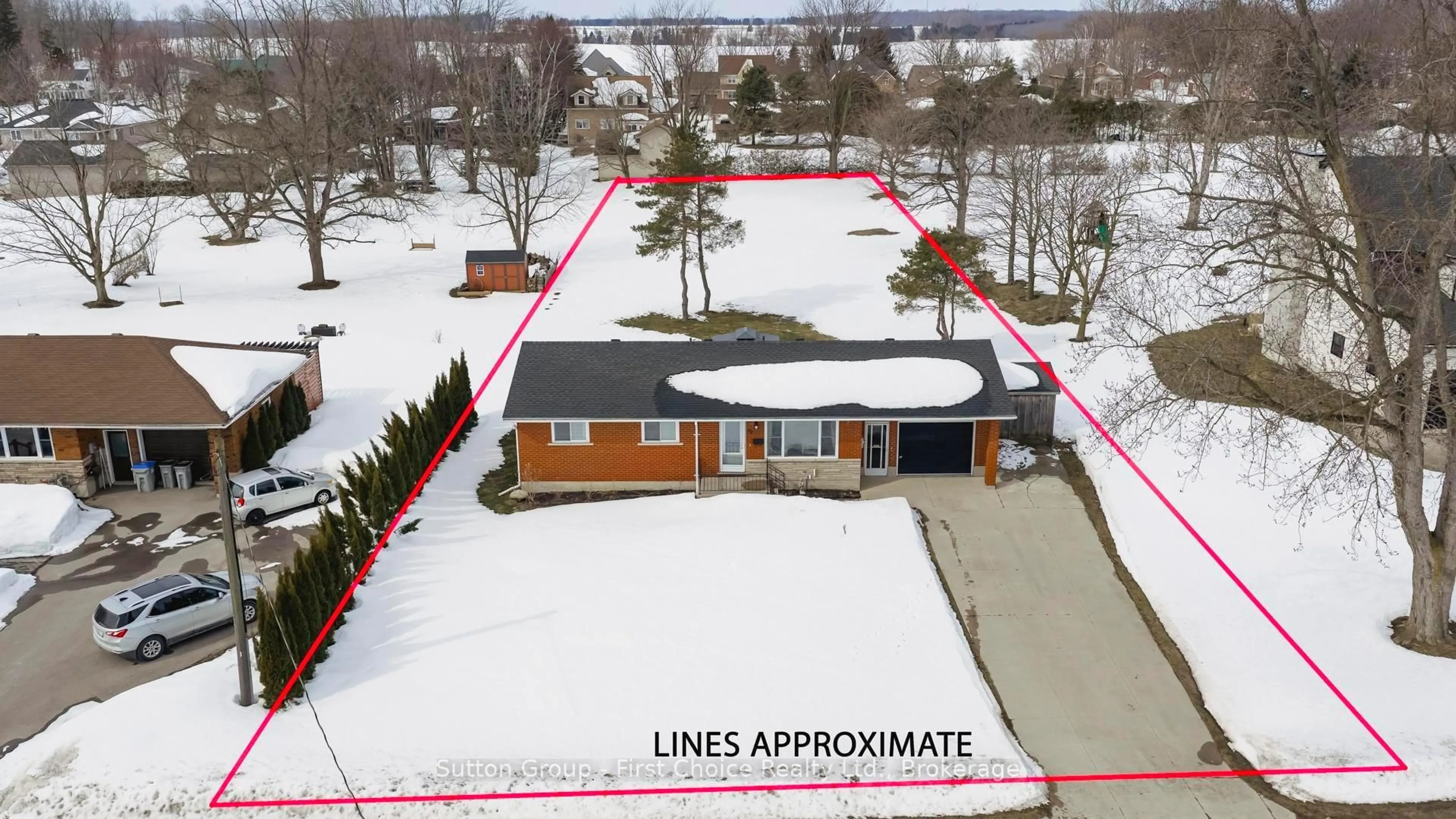 A pic from outside/outdoor area/front of a property/back of a property/a pic from drone, street for 52 Water St, Huron East Ontario N0K 1G0