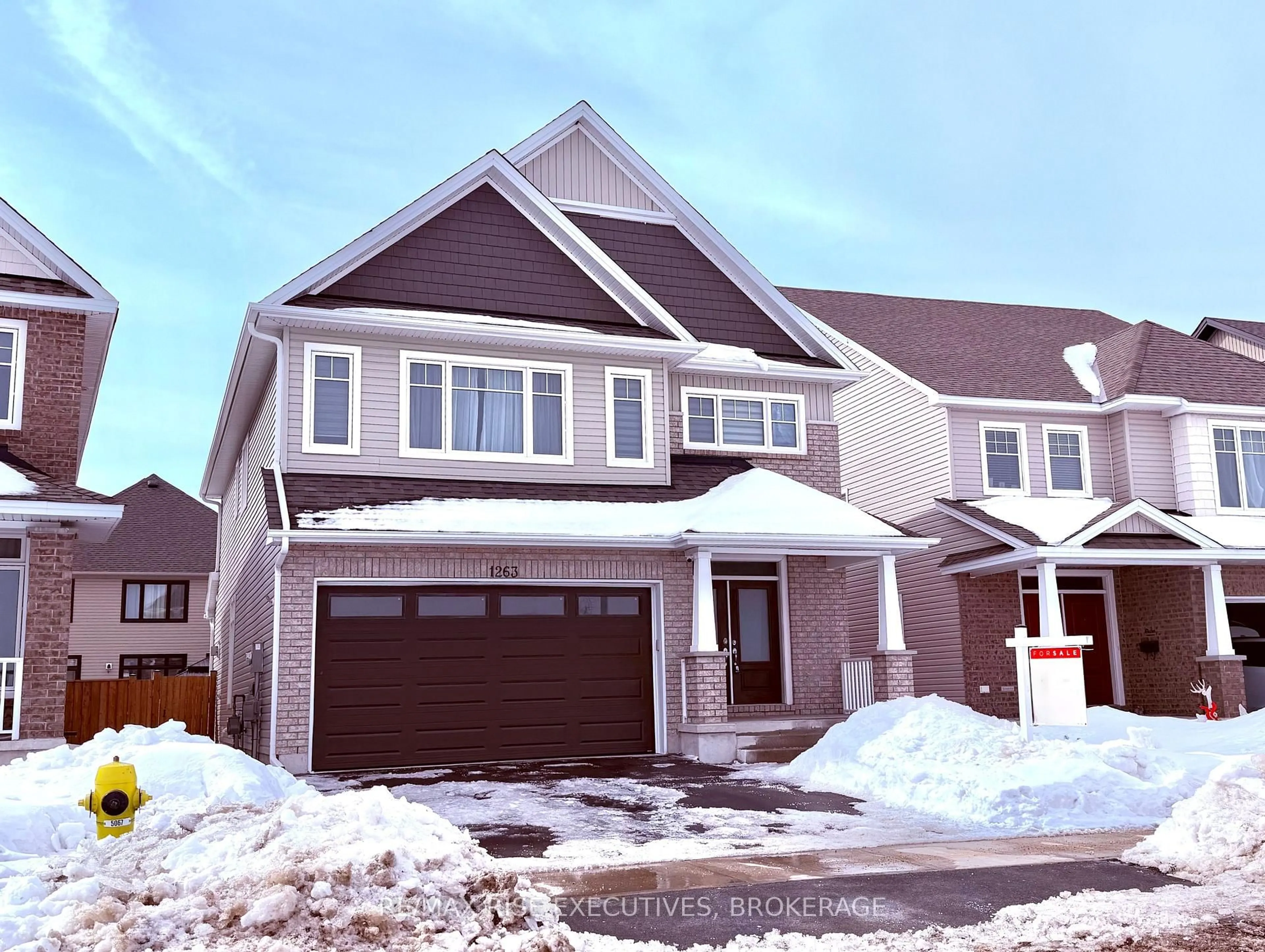 Home with vinyl exterior material, street for 1263 Wheathill St, Kingston Ontario K7M 0H4