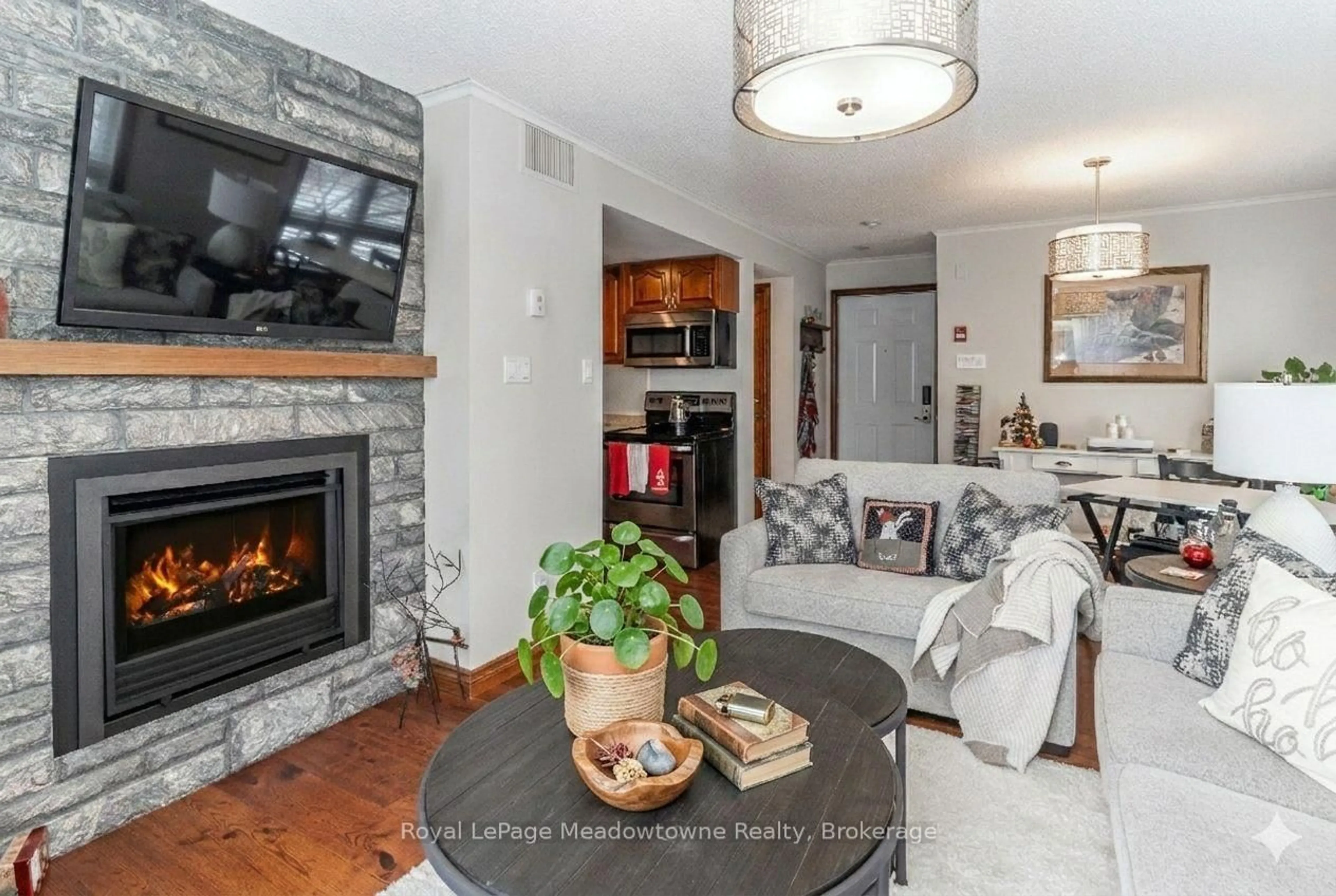 Living room with furniture, unknown for 34 Deerhurst Greens Rd #301, Huntsville Ontario P1H 1A9