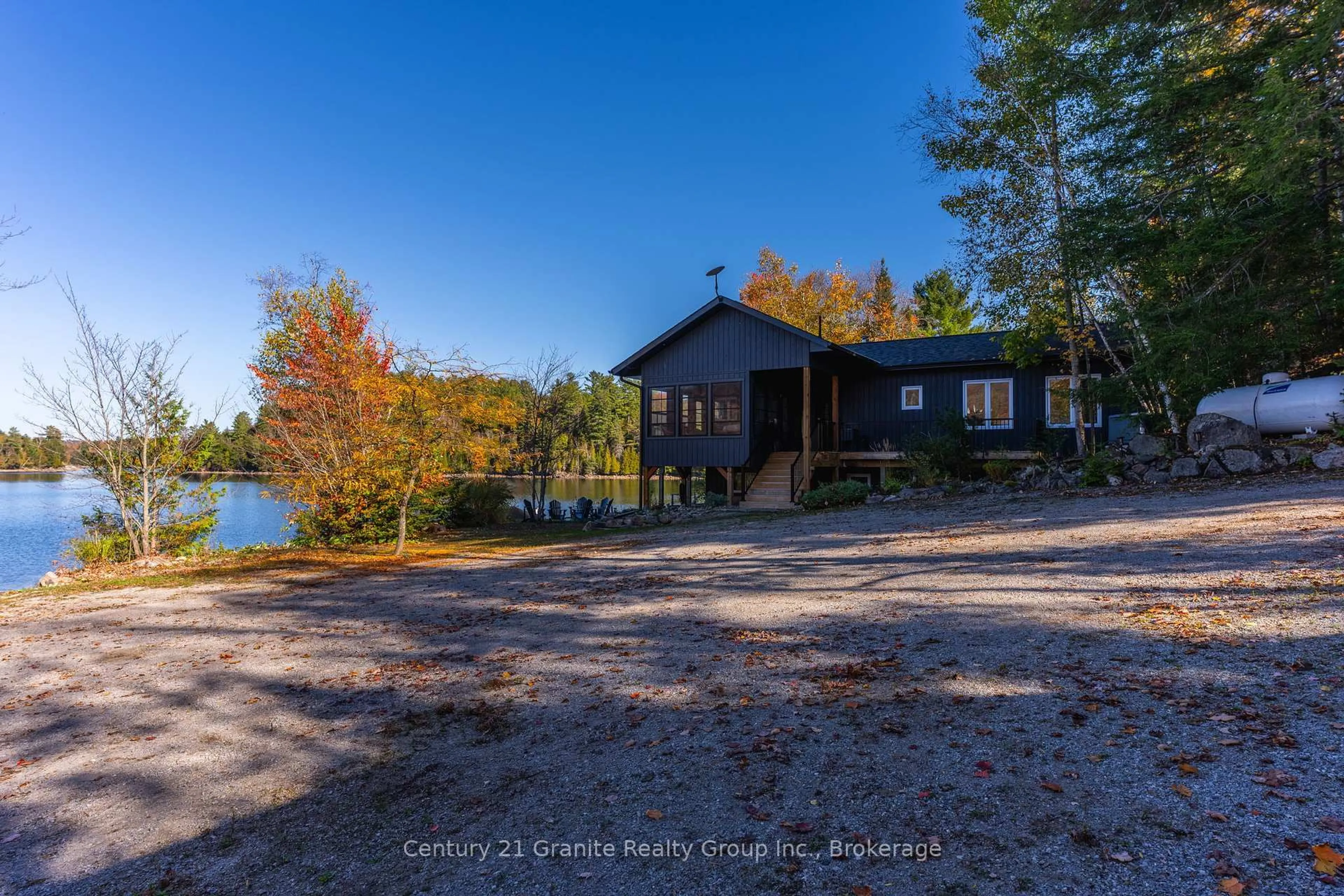 A pic from outside/outdoor area/front of a property/back of a property/a pic from drone, water/lake/river/ocean view for 1526 Curry Rd, Dysart et al Ontario K0M 2K0