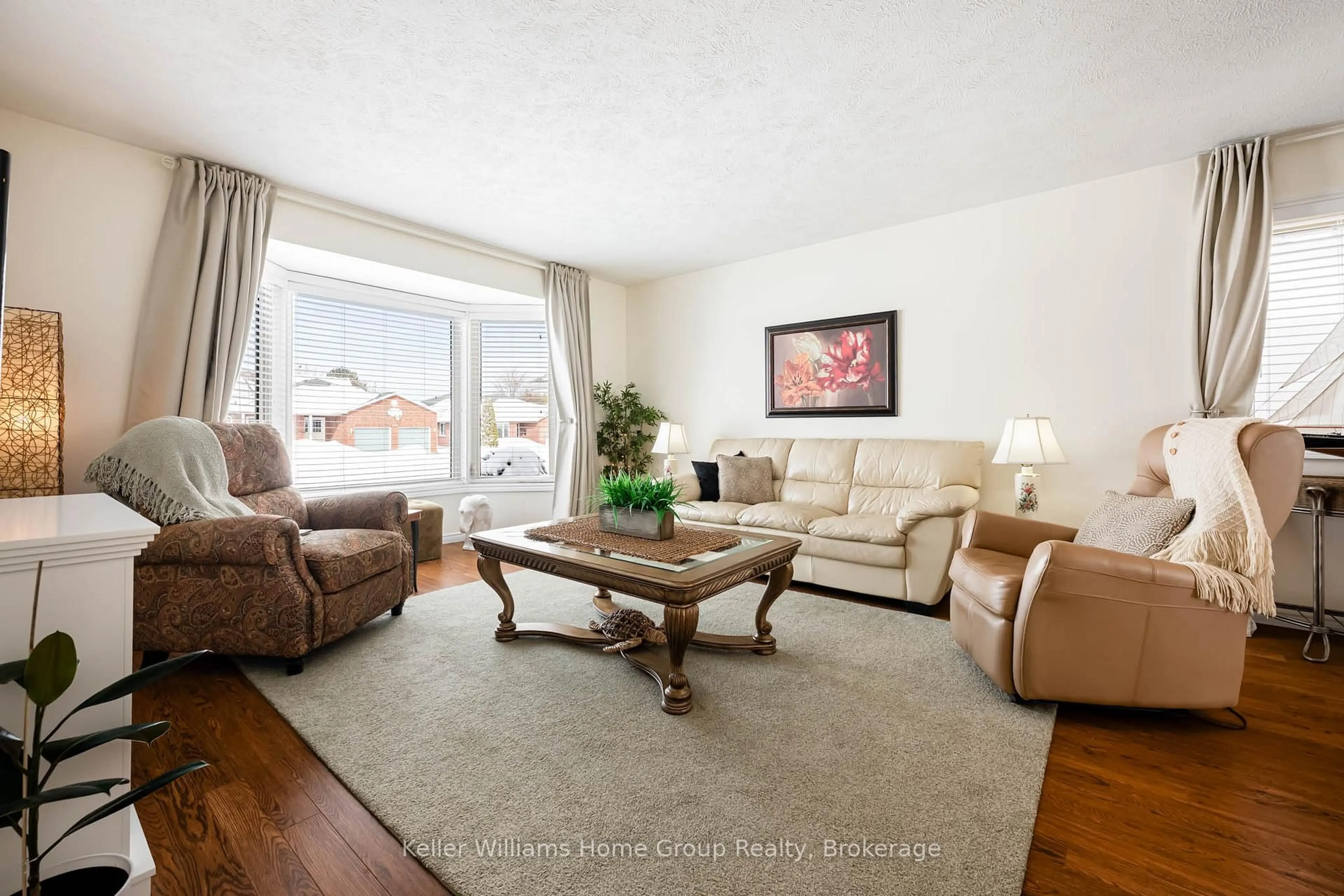 Living room with furniture, wood/laminate floor for 550 MAPLE Ave, North Perth Ontario N4W 3G5