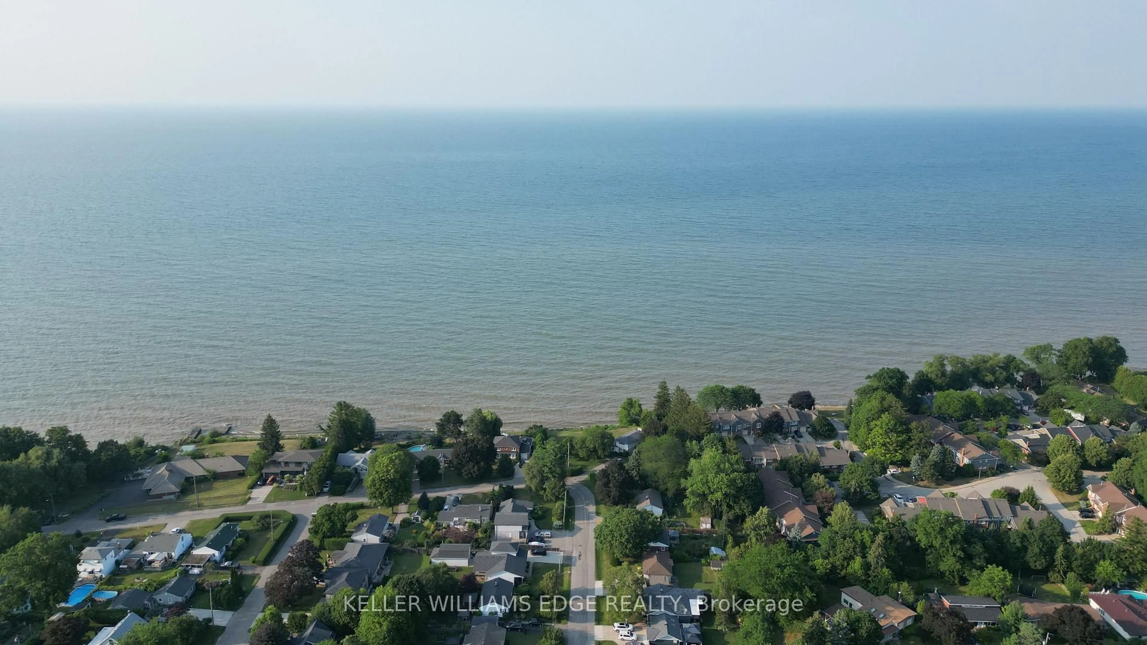 A pic from outside/outdoor area/front of a property/back of a property/a pic from drone, water/lake/river/ocean view for 31 Book Rd #17, Grimsby Ontario L3M 2M3