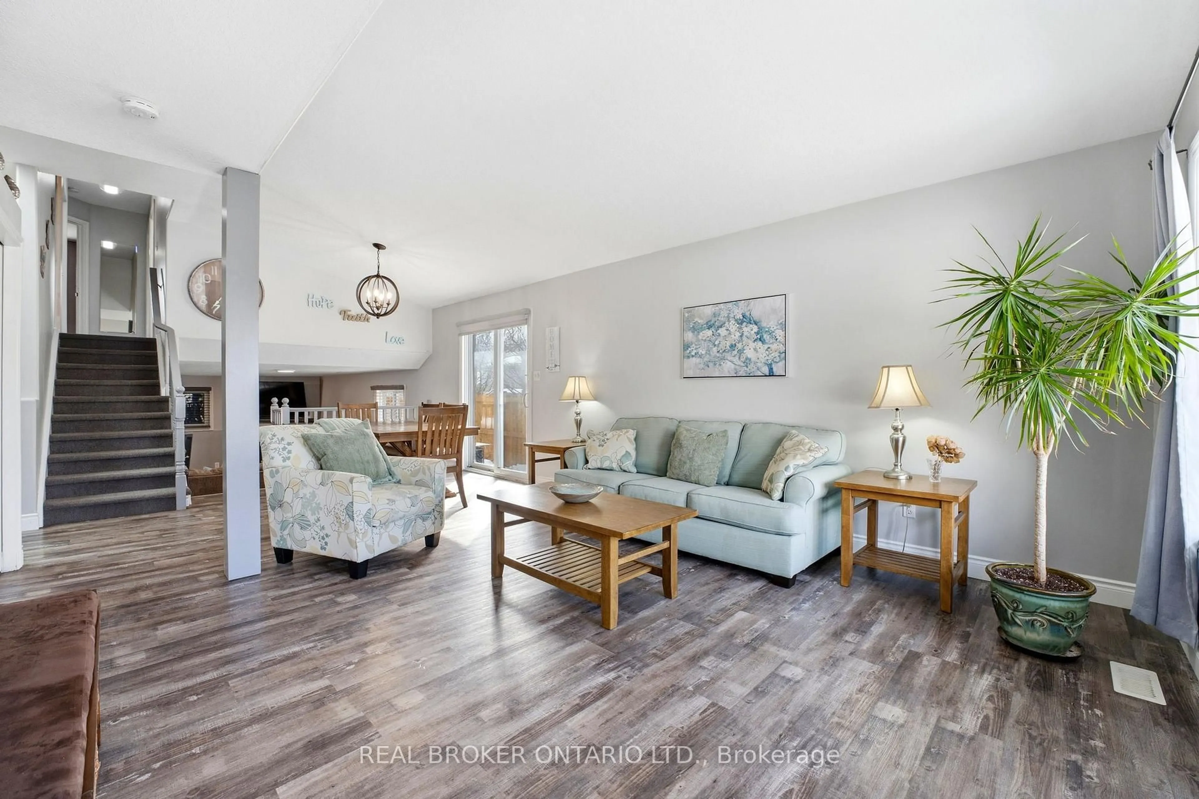 Living room with furniture, wood/laminate floor for 25 bitternut Pl, Woolwich Ontario N3B 3L2