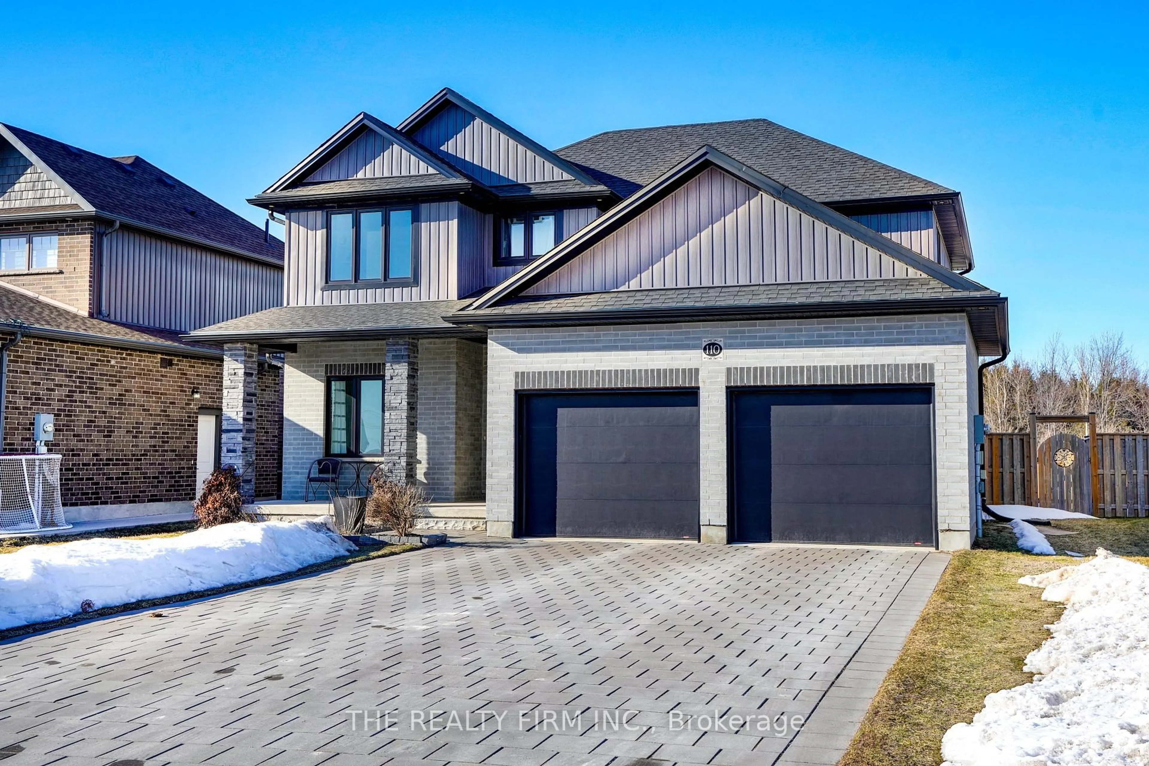 Home with brick exterior material, street for 110 Stuart Ave, Lucan Biddulph Ontario N0M 2J0