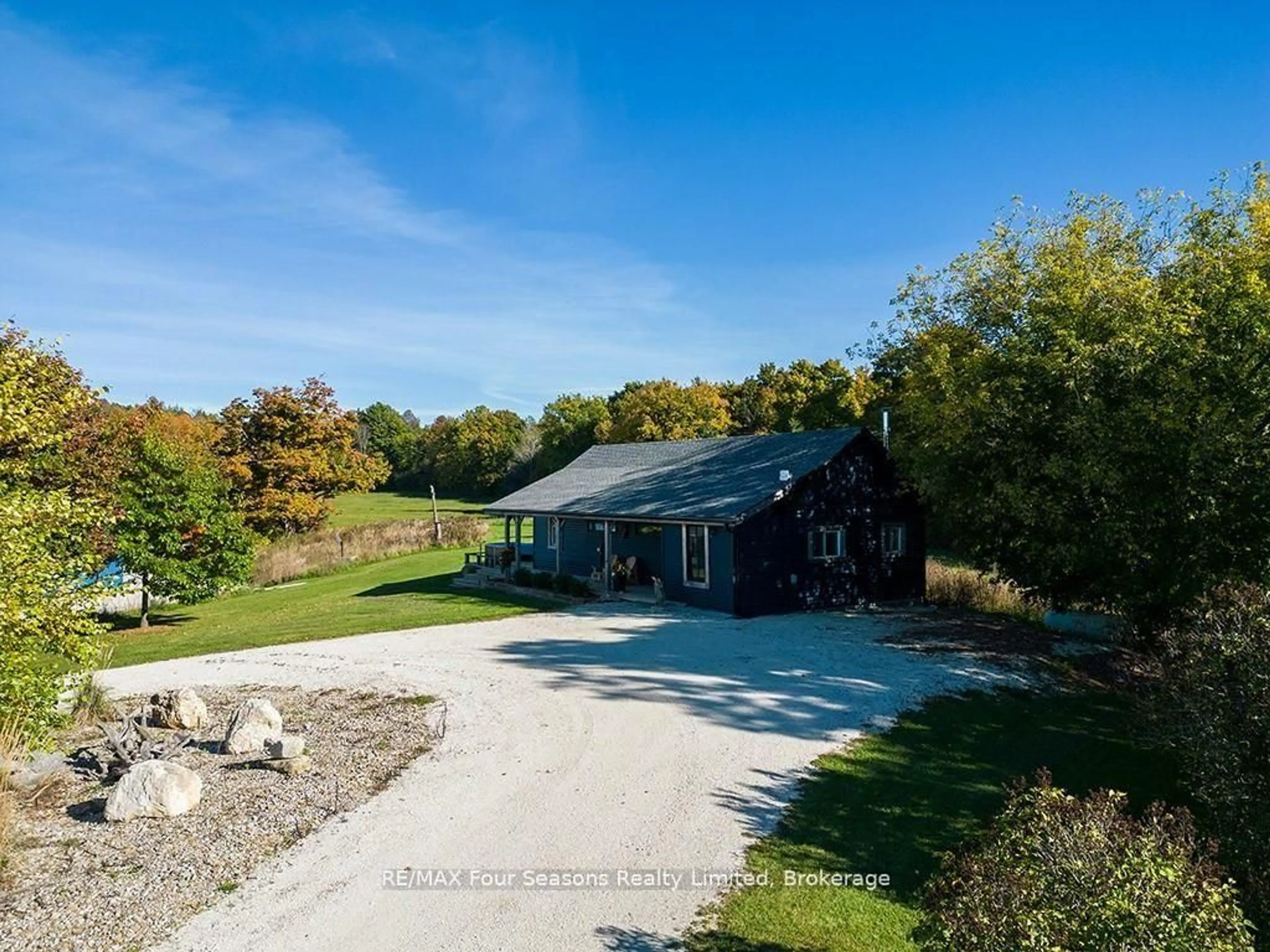 A pic from outside/outdoor area/front of a property/back of a property/a pic from drone, unknown for 495529 Grey Road 2, Blue Mountains Ontario N0H 2E0