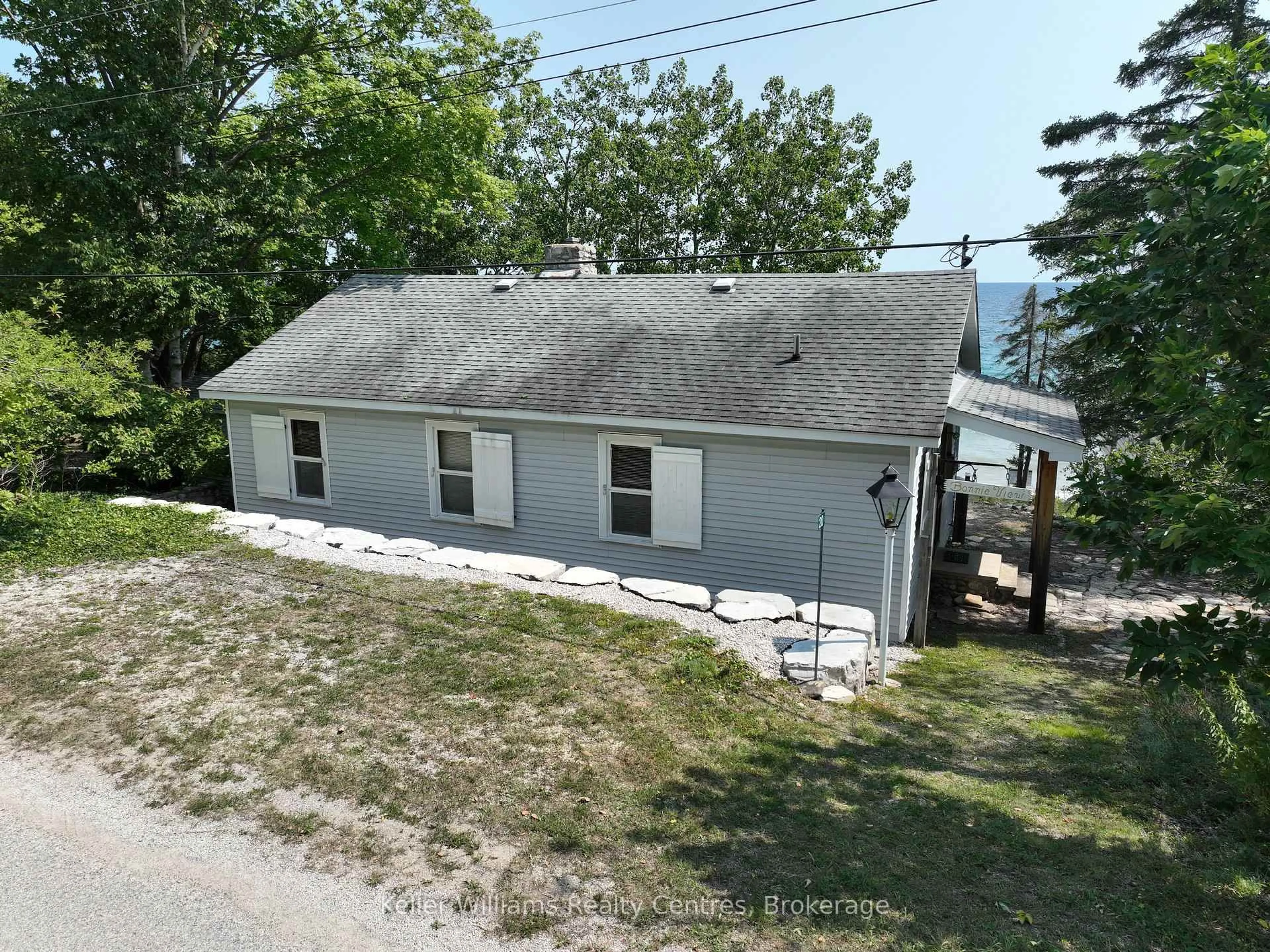 A pic from outside/outdoor area/front of a property/back of a property/a pic from drone, unknown for 20 Birch Rd, Northern Bruce Peninsula Ontario N0H 1Z0