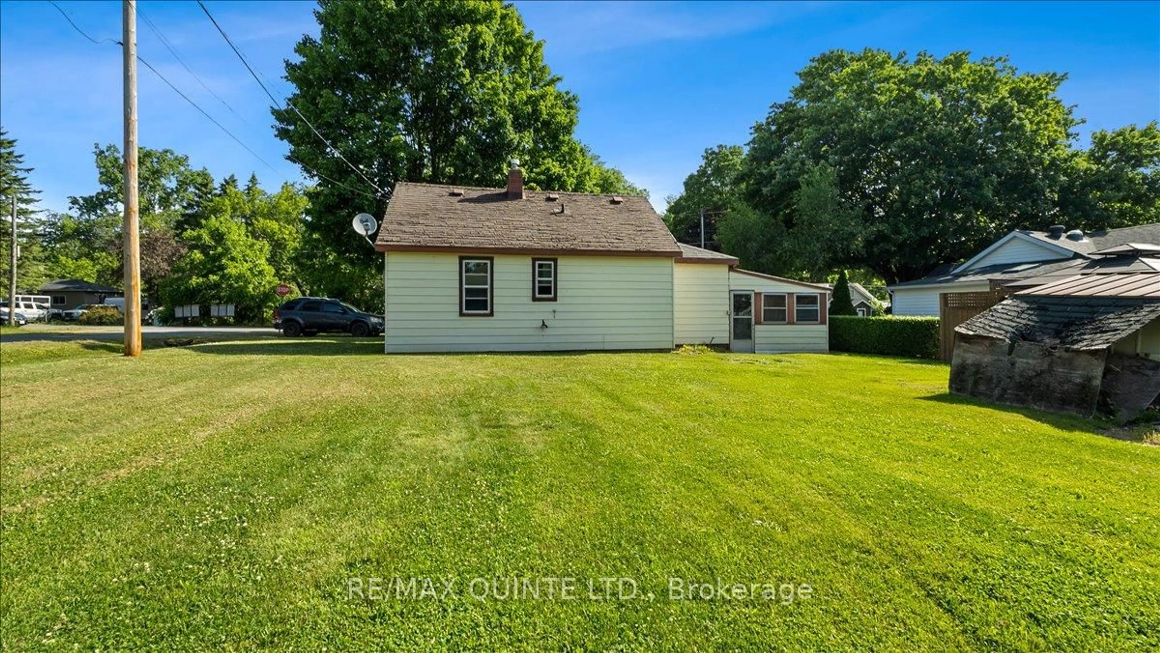 A pic from outside/outdoor area/front of a property/back of a property/a pic from drone, unknown for 23 Fawcett Ave, Prince Edward County Ontario K0K 2T0