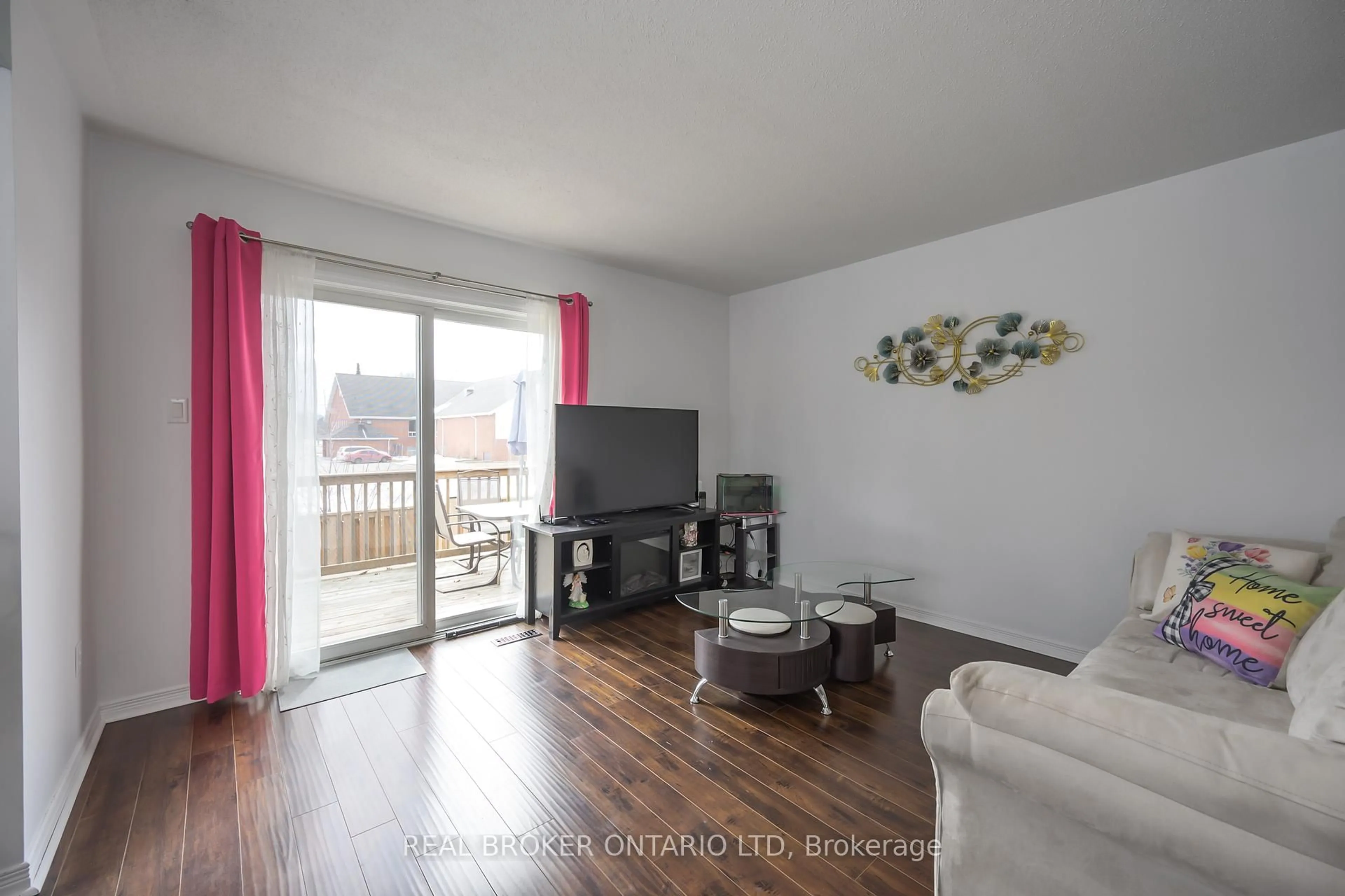 Living room with furniture, wood/laminate floor for 195 Barker St #26, London East Ontario N5Y 1Y2