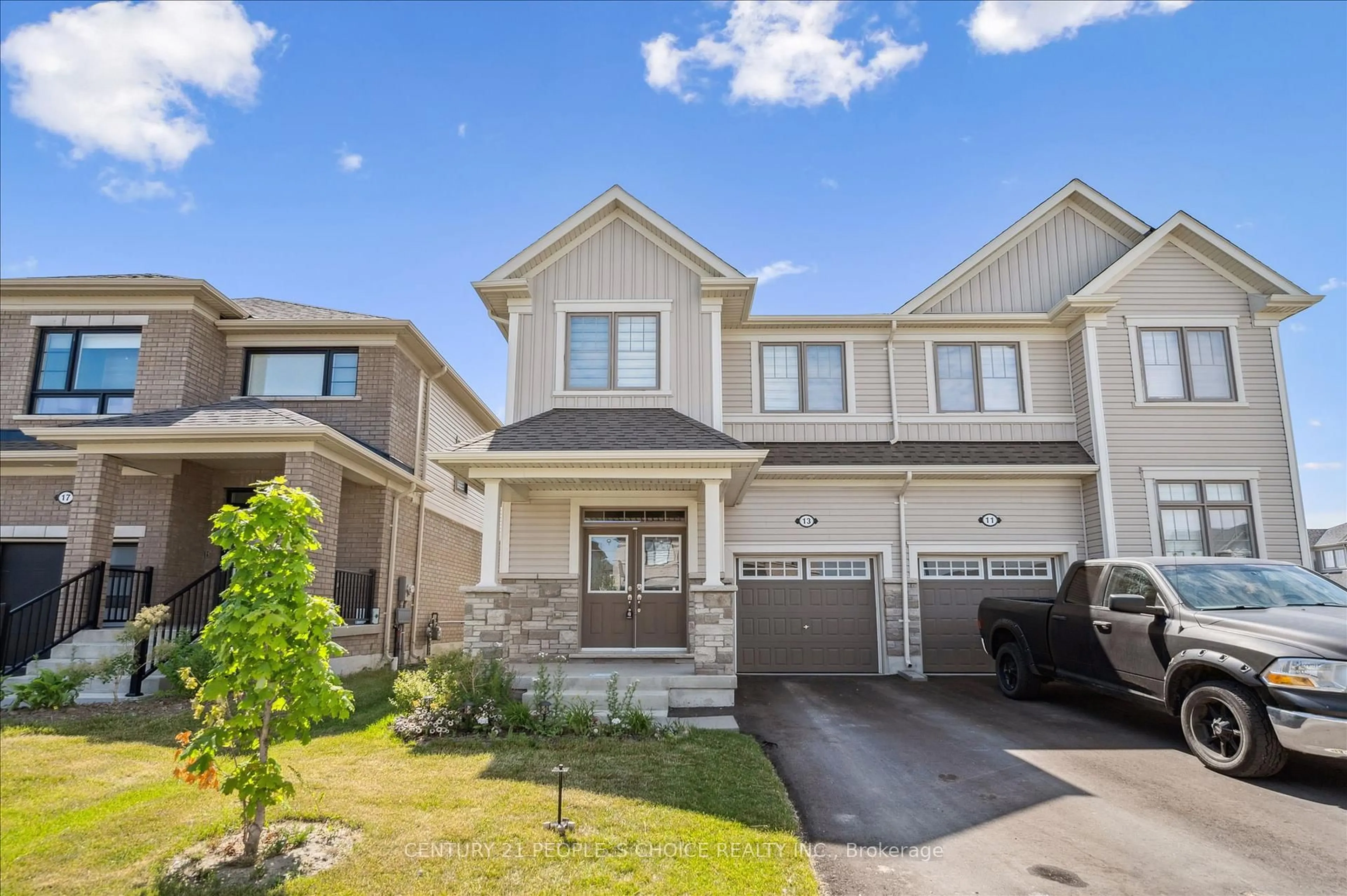 Home with vinyl exterior material, street for 13 Povey Rd, Centre Wellington Ontario N1M 2W3