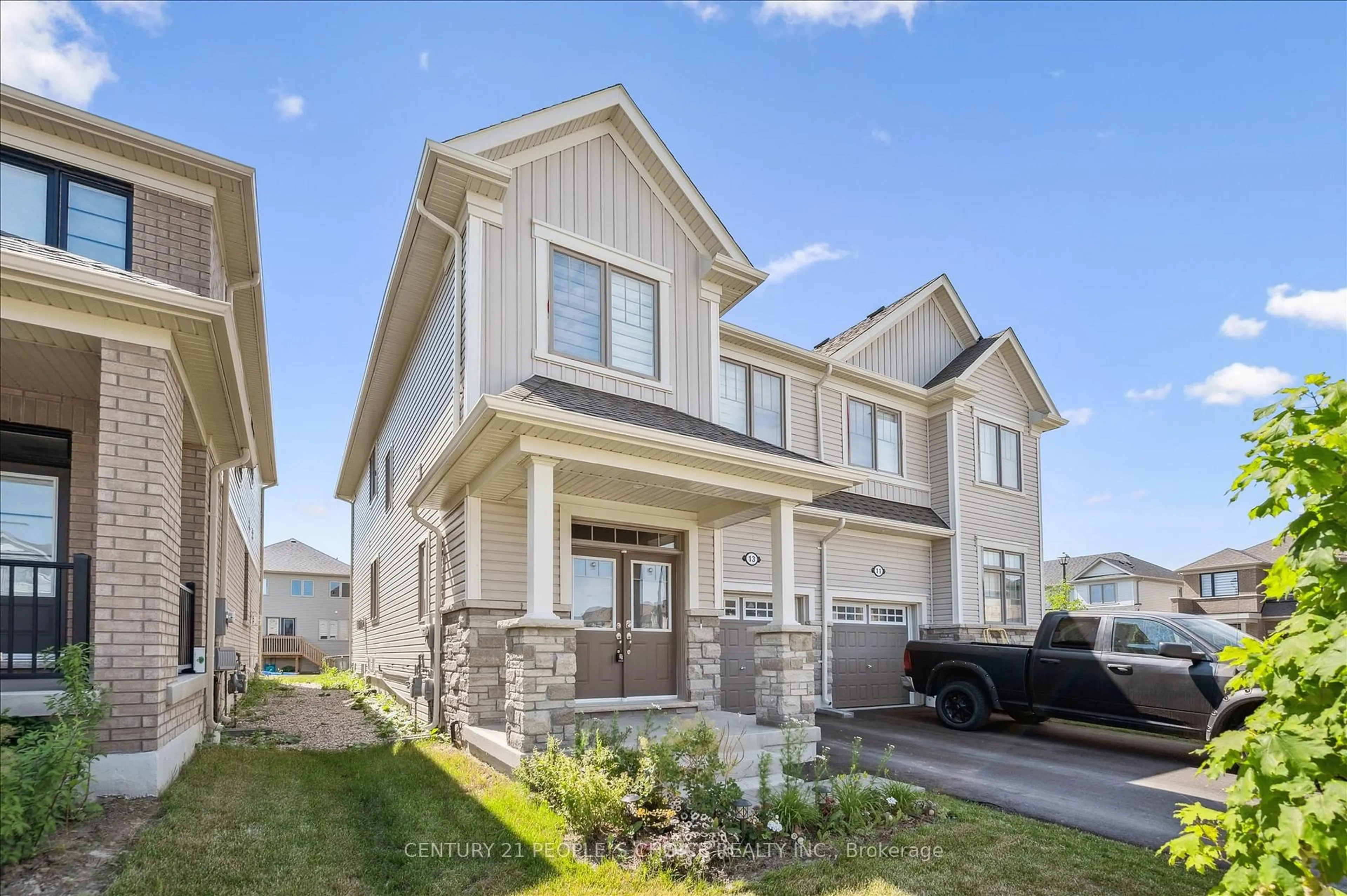 Home with vinyl exterior material, street for 13 Povey Rd, Centre Wellington Ontario N1M 2W3