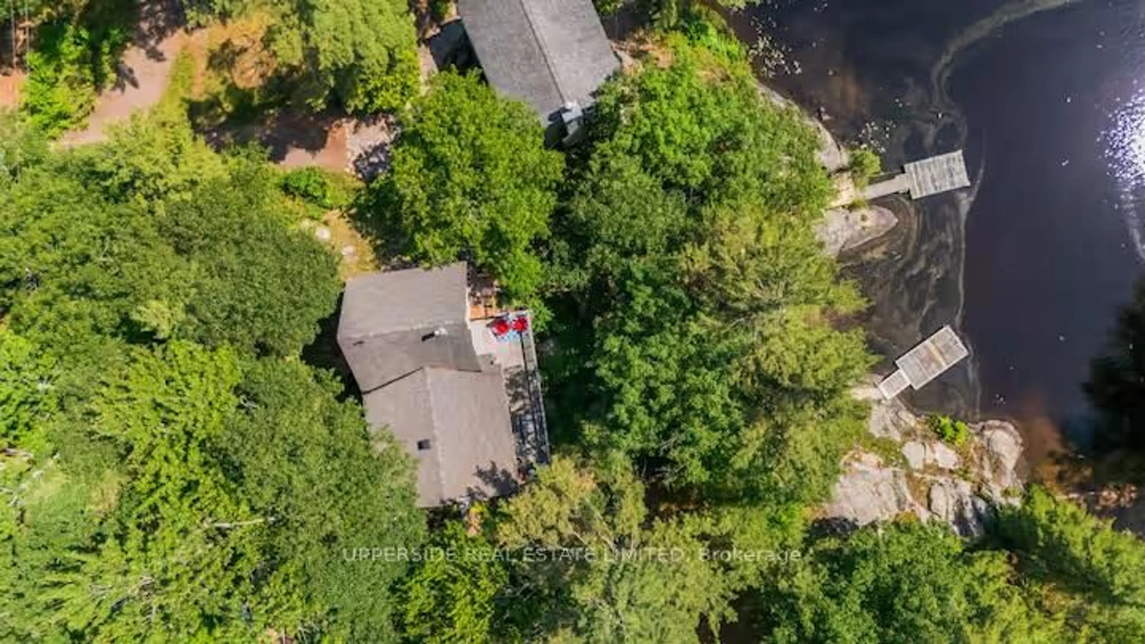 A pic from outside/outdoor area/front of a property/back of a property/a pic from drone, forest/trees view for 1040 OAK Rd, Gravenhurst Ontario P0E 1G0