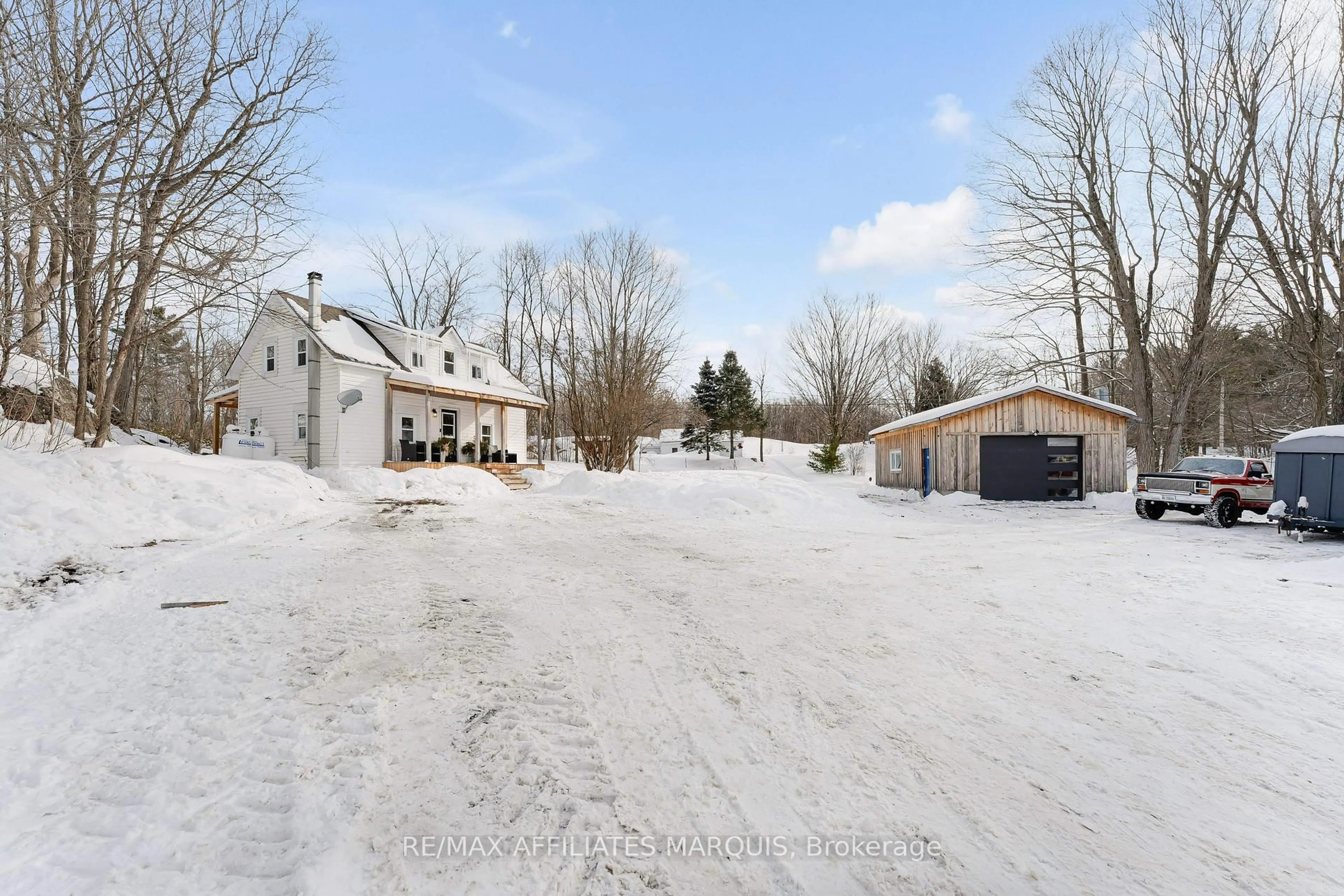 A pic from outside/outdoor area/front of a property/back of a property/a pic from drone, street for 14702 38 Rd, Sharbot Lake Ontario K0H 2P0