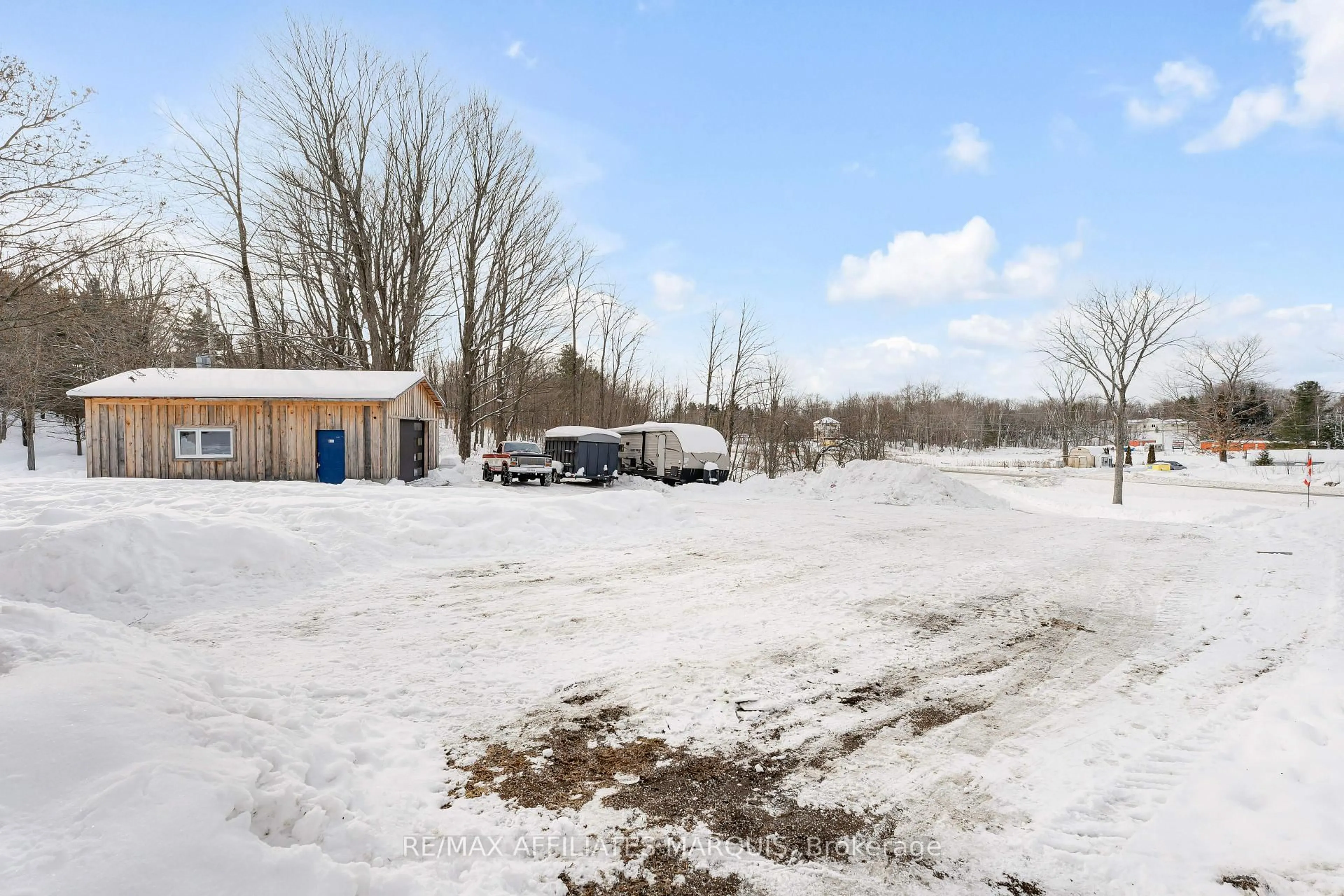 A pic from outside/outdoor area/front of a property/back of a property/a pic from drone, unknown for 14702 38 Rd, Sharbot Lake Ontario K0H 2P0