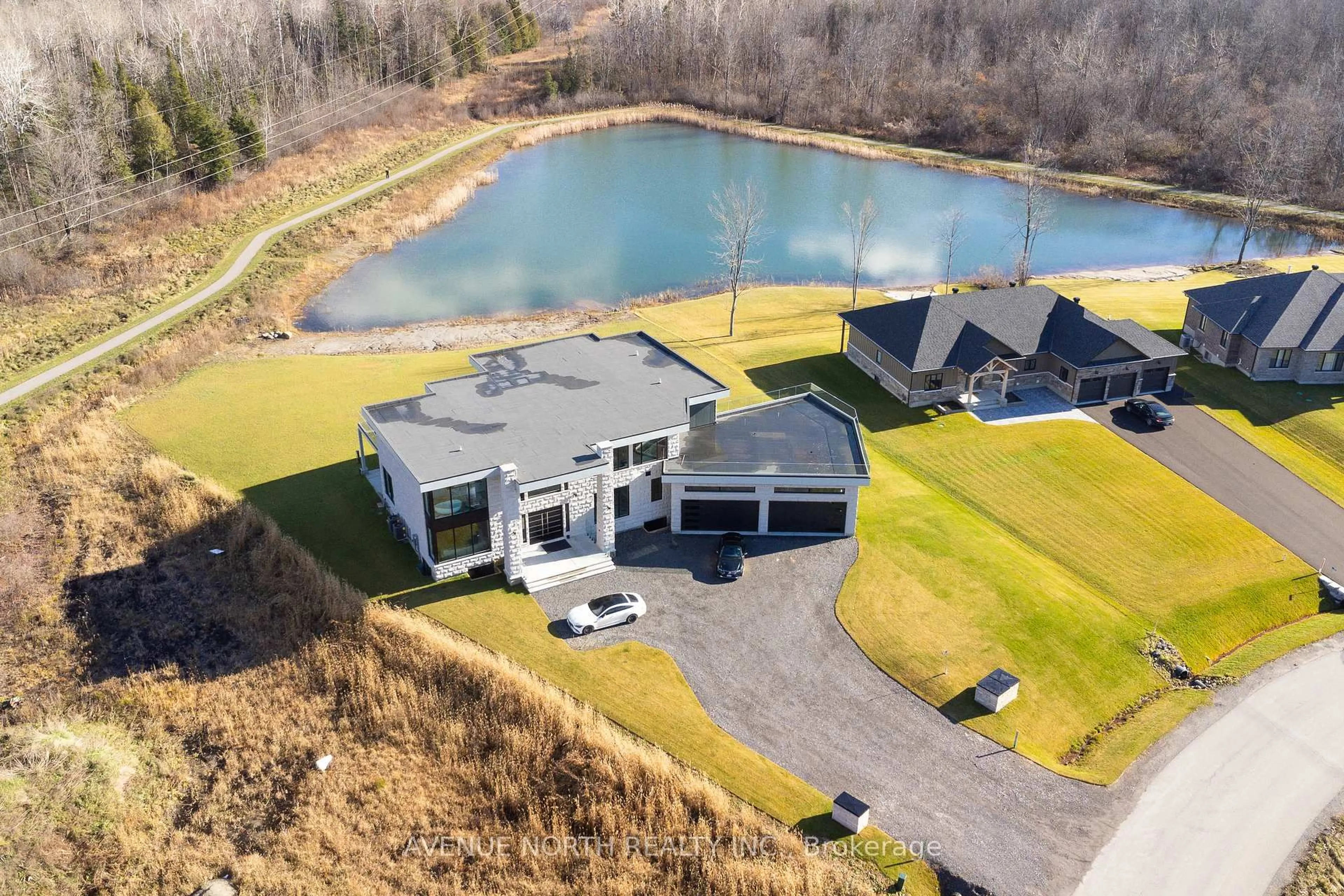 A pic from outside/outdoor area/front of a property/back of a property/a pic from drone, water/lake/river/ocean view for 493 Shoreway Dr, Greely Ontario K4P 0G3