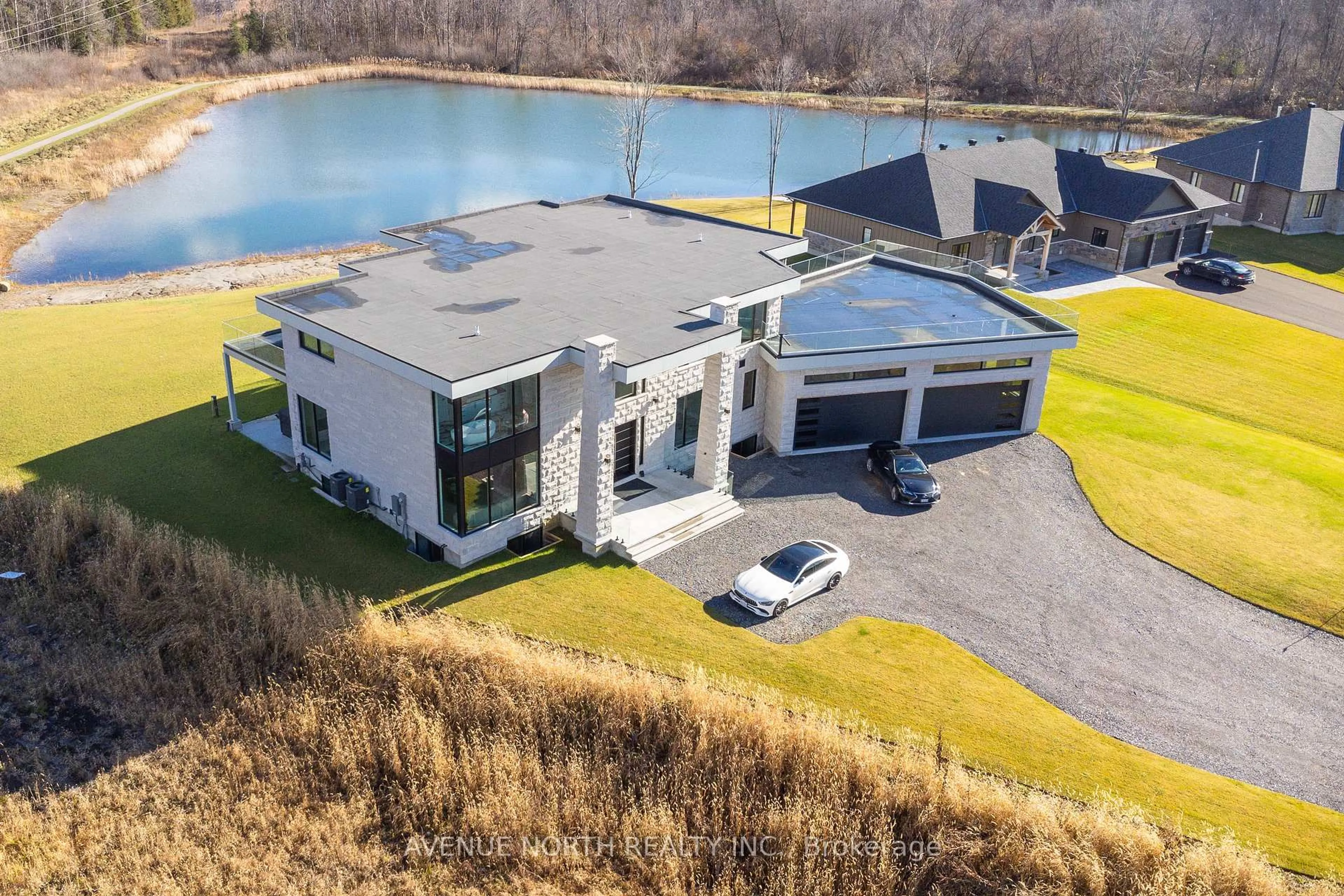 A pic from outside/outdoor area/front of a property/back of a property/a pic from drone, water/lake/river/ocean view for 493 Shoreway Dr, Greely Ontario K4P 0G3