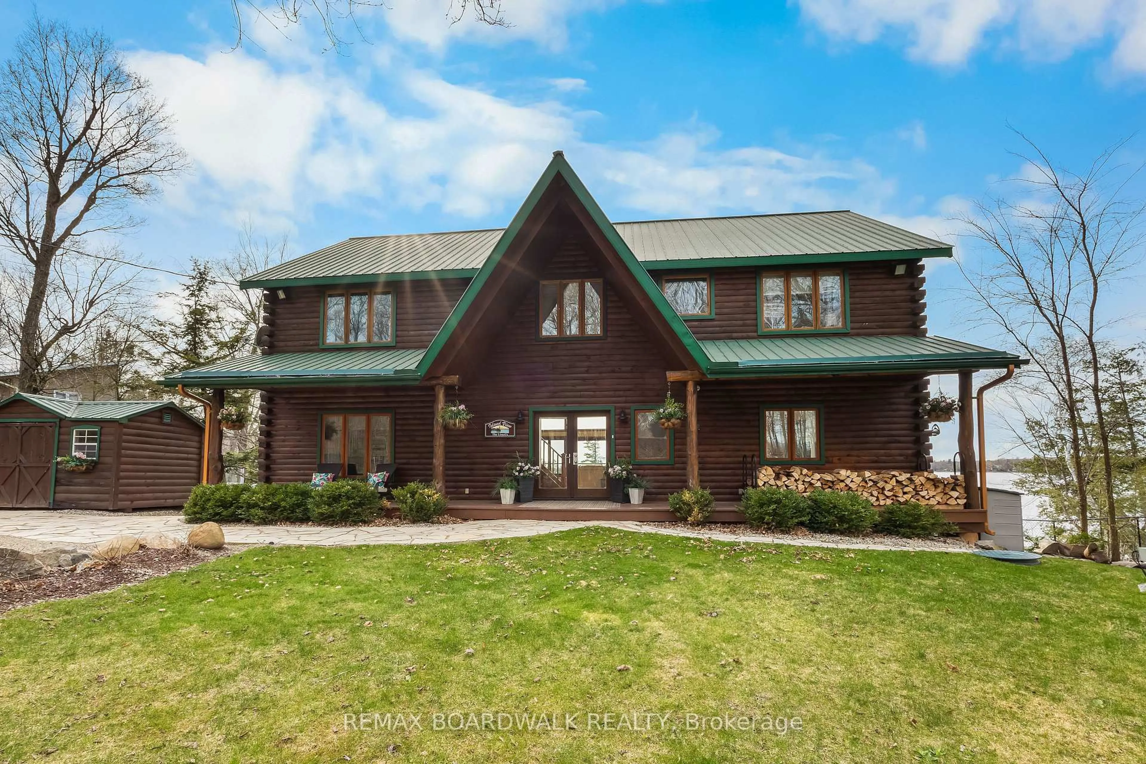 Home with brick exterior material, mountain view for 122 Red Rock Bay Rd, Perth Ontario K7H 3C8