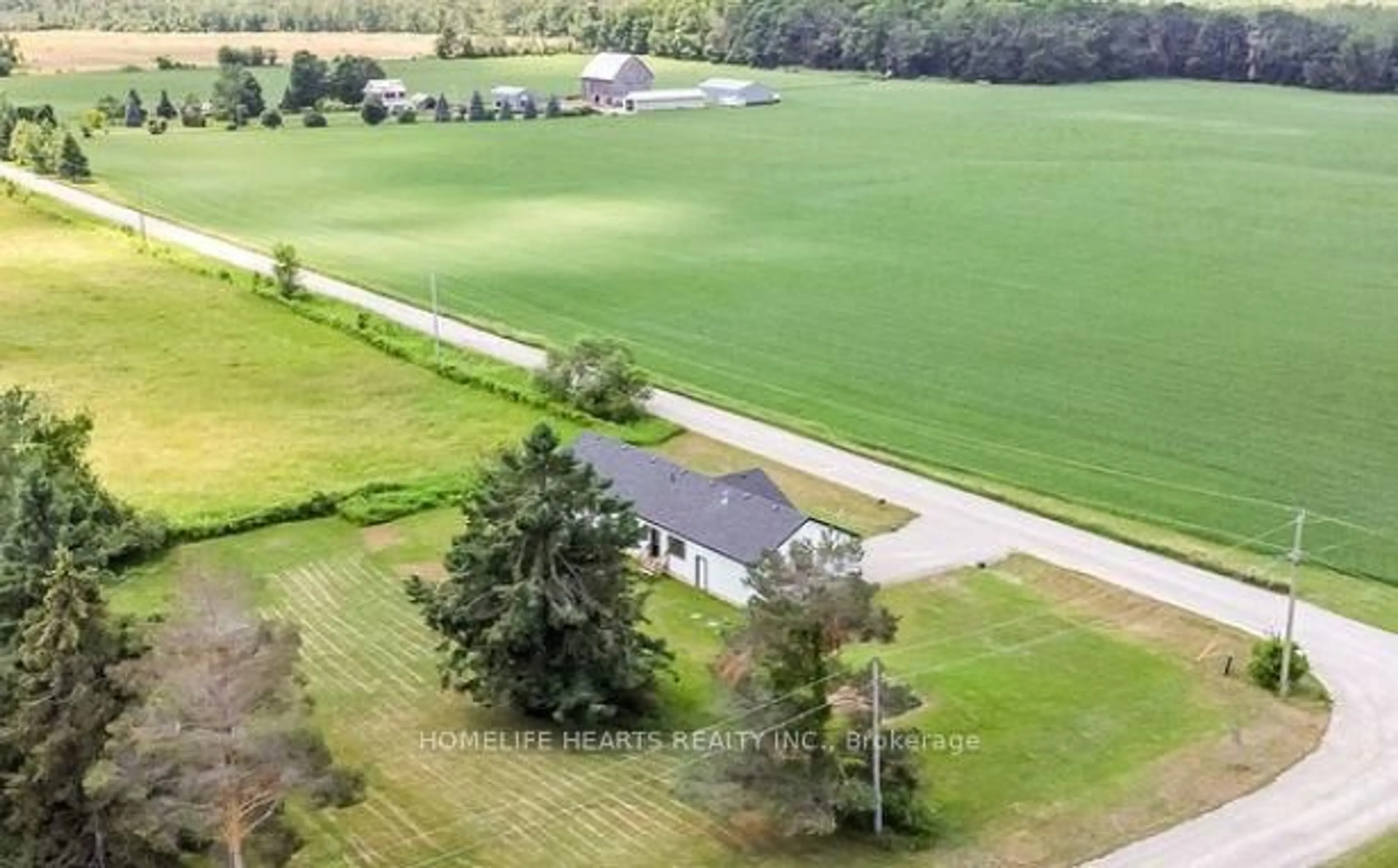 A pic from outside/outdoor area/front of a property/back of a property/a pic from drone, water/lake/river/ocean view for 122 Day Dr, Kawartha Lakes Ontario L3V 6H5