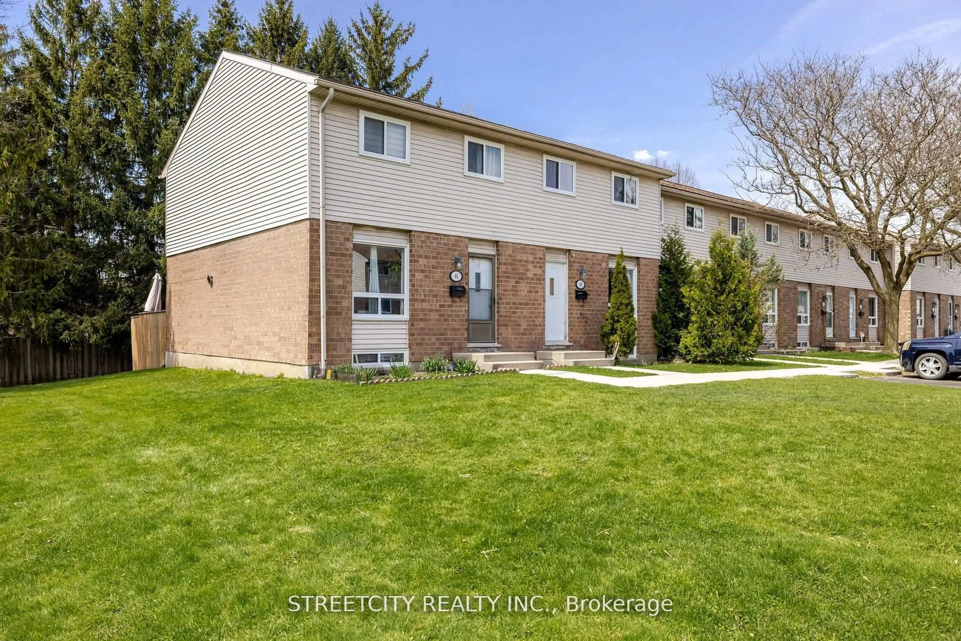 A pic from outside/outdoor area/front of a property/back of a property/a pic from drone, street for 311 Vesta Rd #40, London East Ontario N5Y 5J3