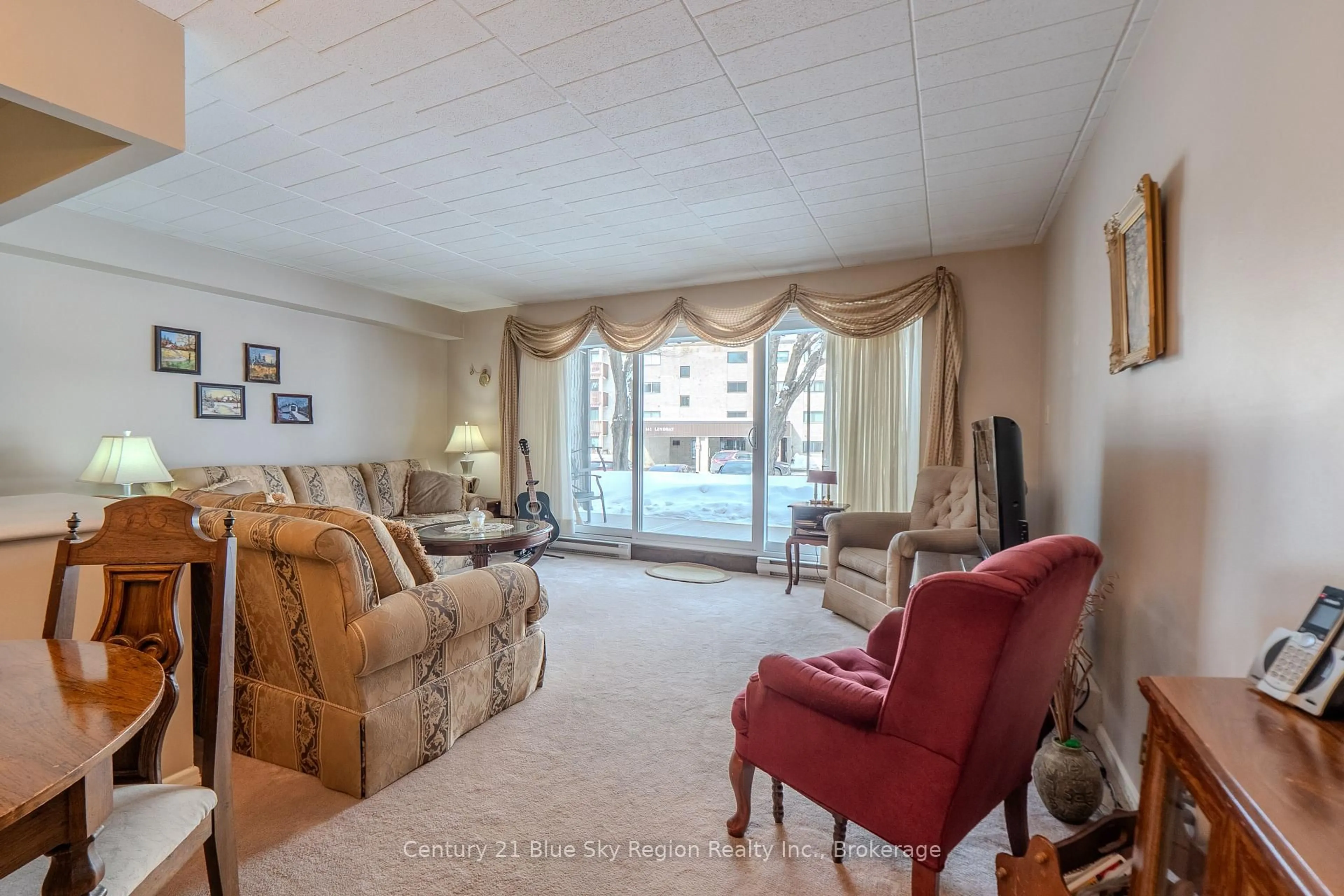 Living room with furniture, unknown for 149 Lindsay St #104, North Bay Ontario P1B 7Z1