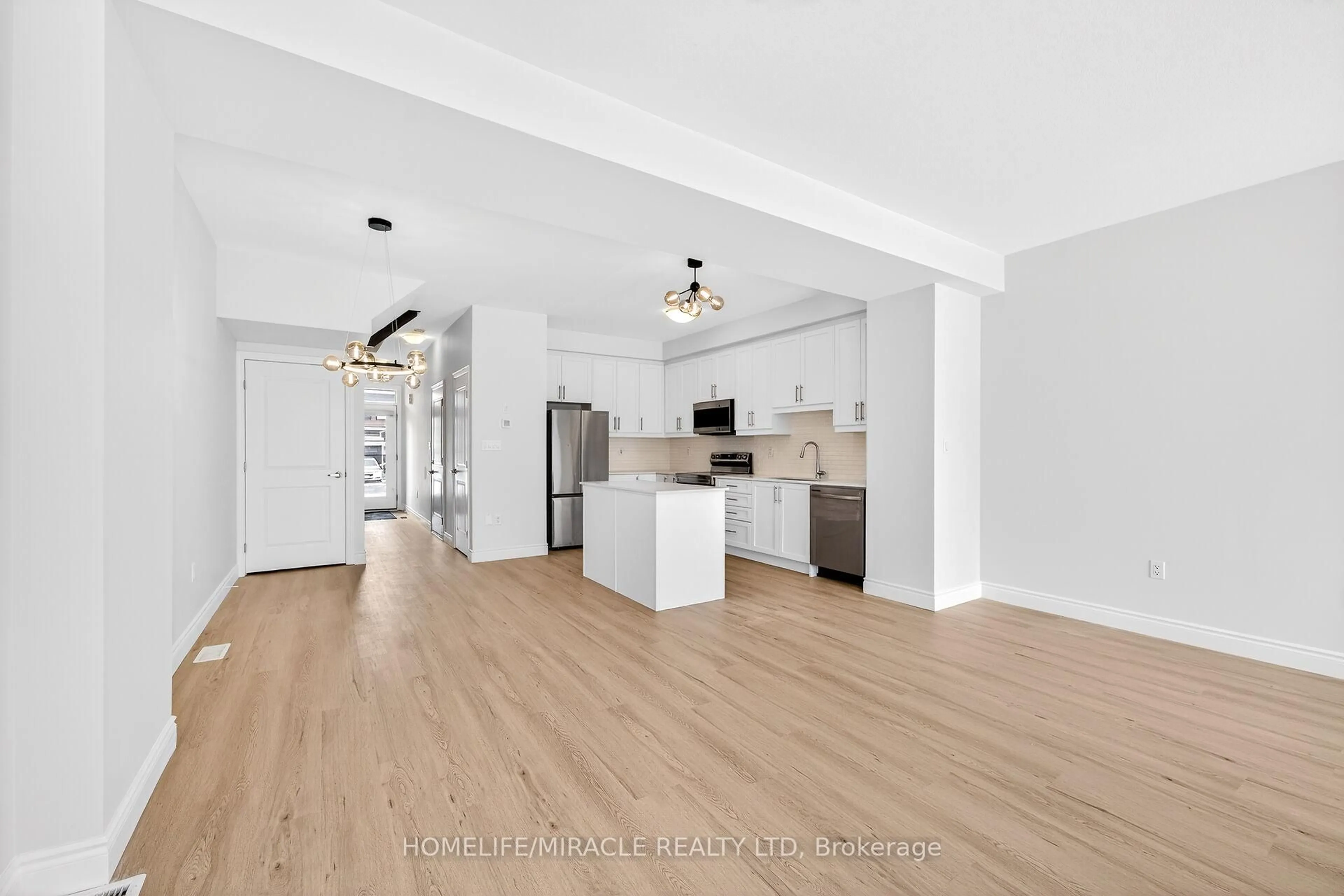 Open concept kitchen, wood/laminate floor for 10 June Callwood Way, Brantford Ontario N3T 0T7