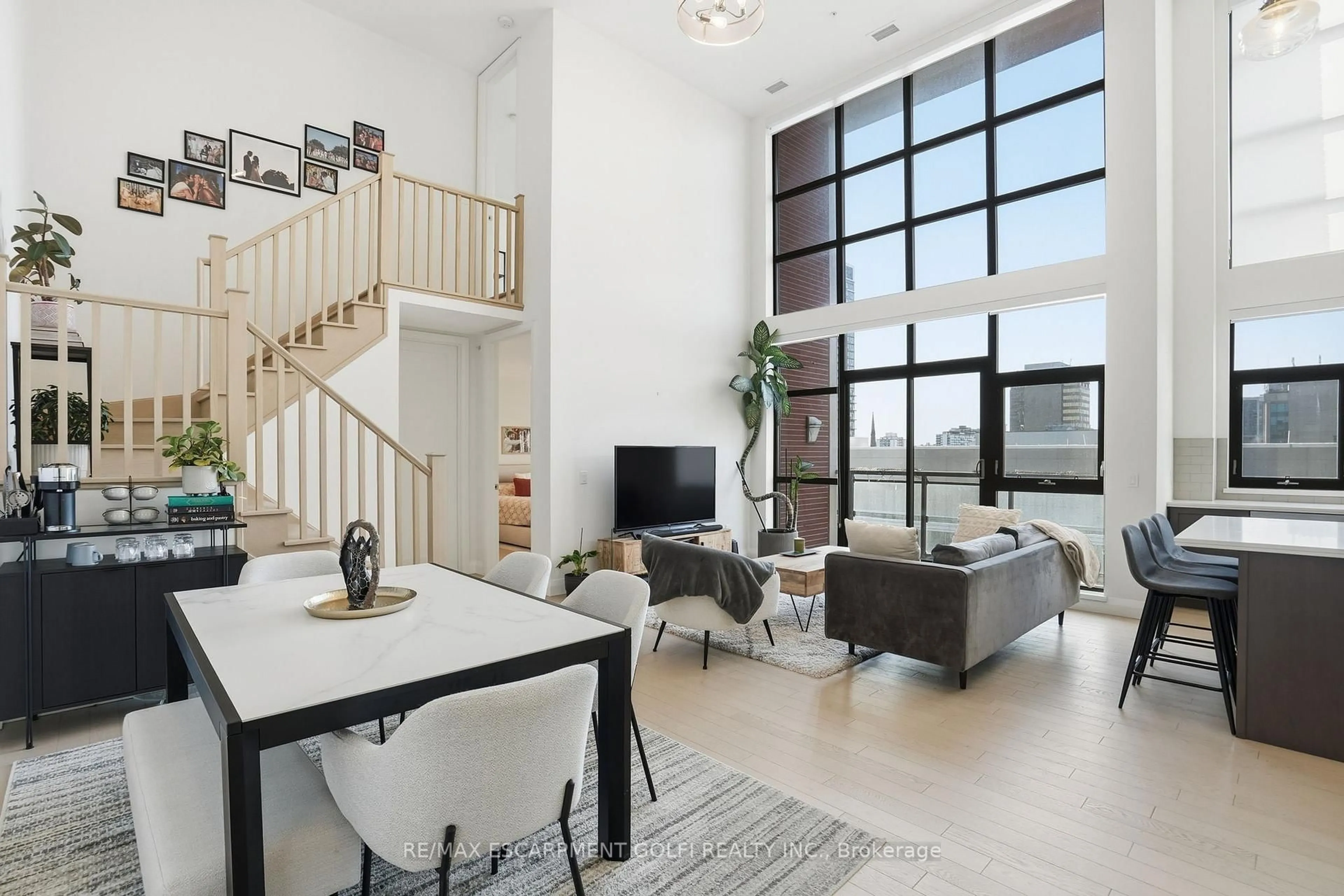 Living room with furniture, unknown for 112 King St #LPH7, Hamilton Ontario L8N 1A8