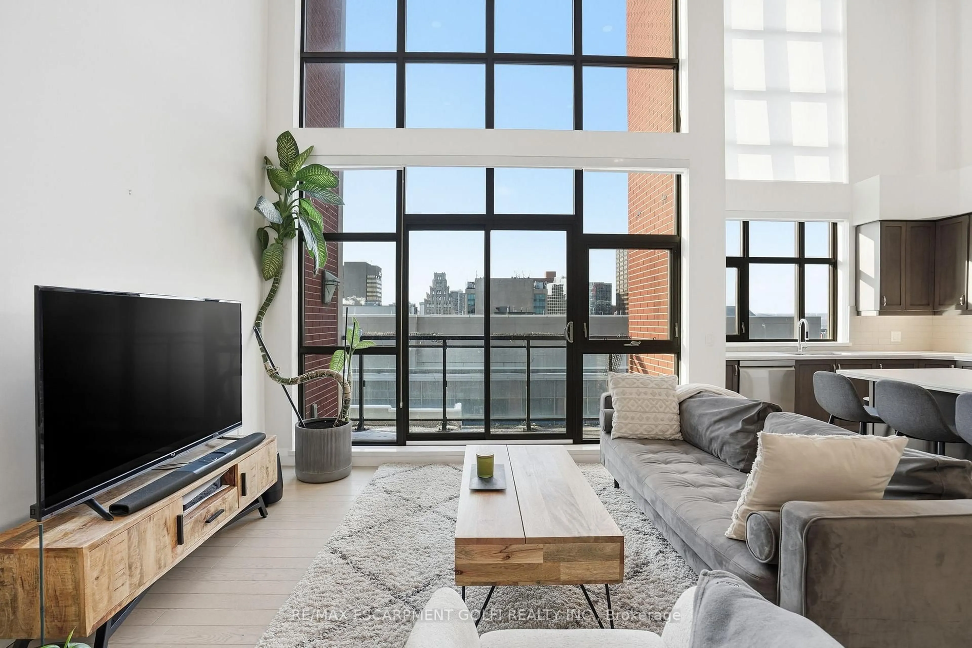 Living room with furniture, unknown for 112 King St #LPH7, Hamilton Ontario L8N 1A8