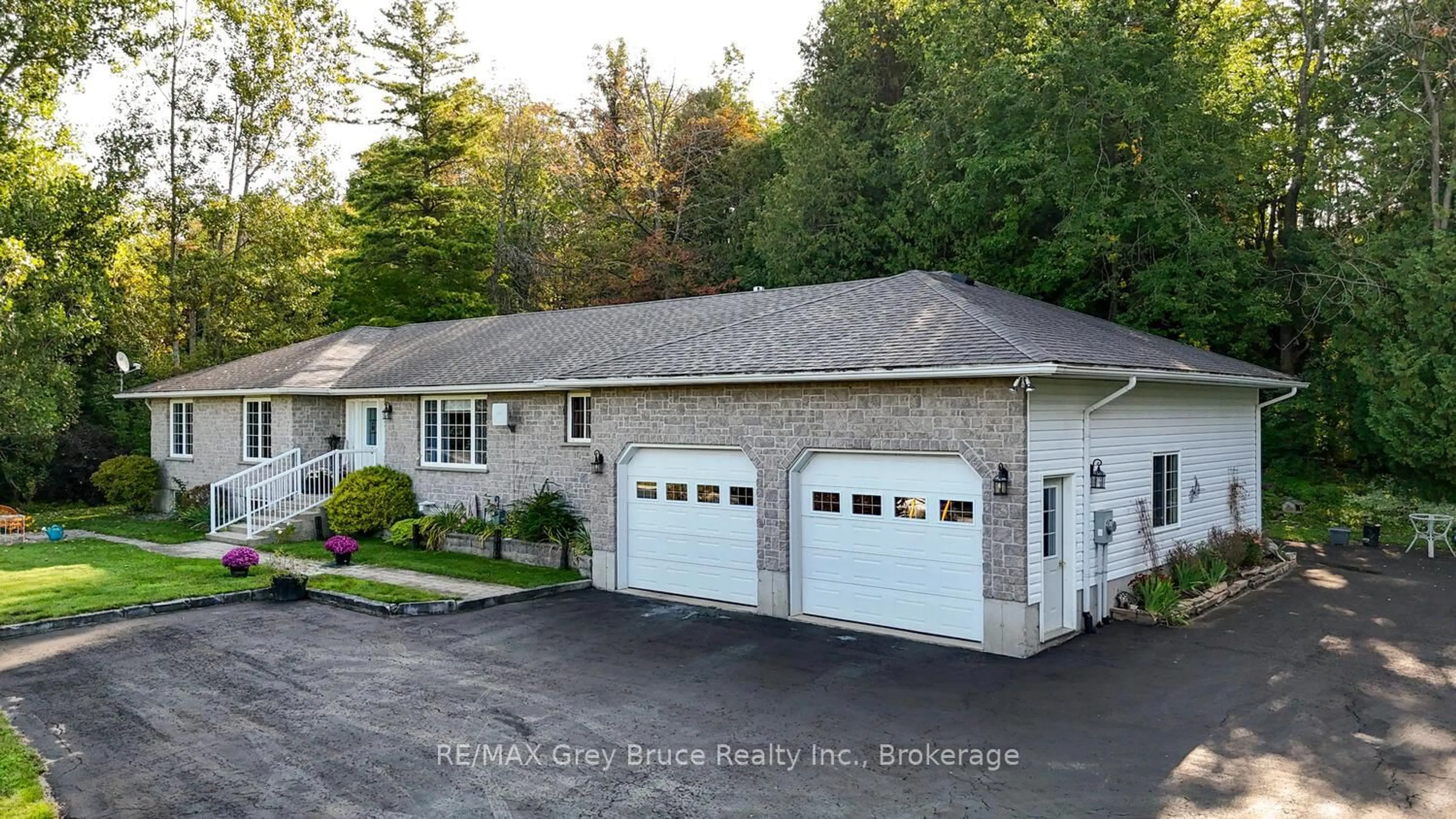 A pic from outside/outdoor area/front of a property/back of a property/a pic from drone, unknown for 501204 Grey 1 Rd, Georgian Bluffs Ontario N0H 2T0