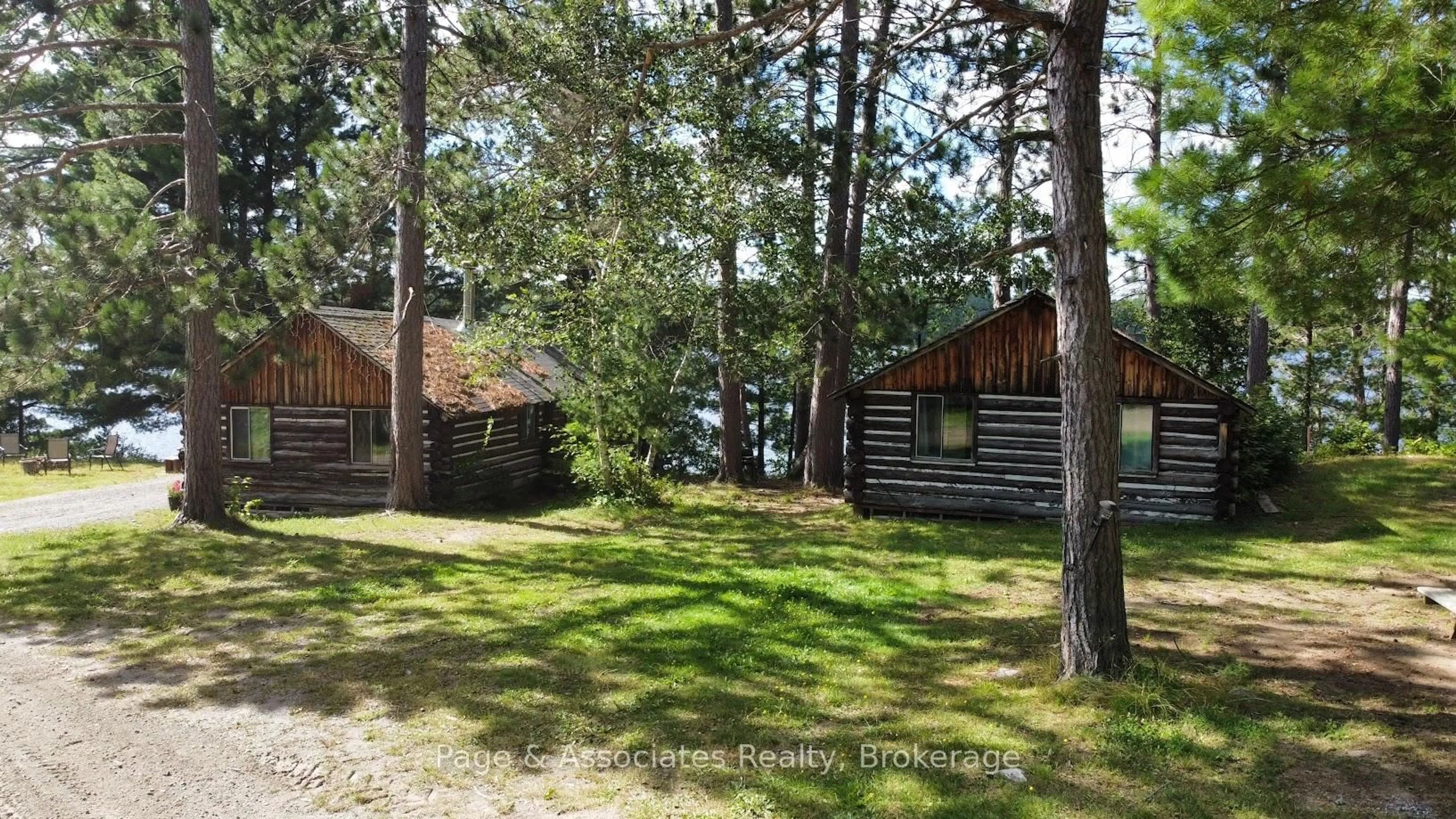A pic from outside/outdoor area/front of a property/back of a property/a pic from drone, forest/trees view for 21 Pine Ridge Dr, West Nipissing Ontario P0H 1L0