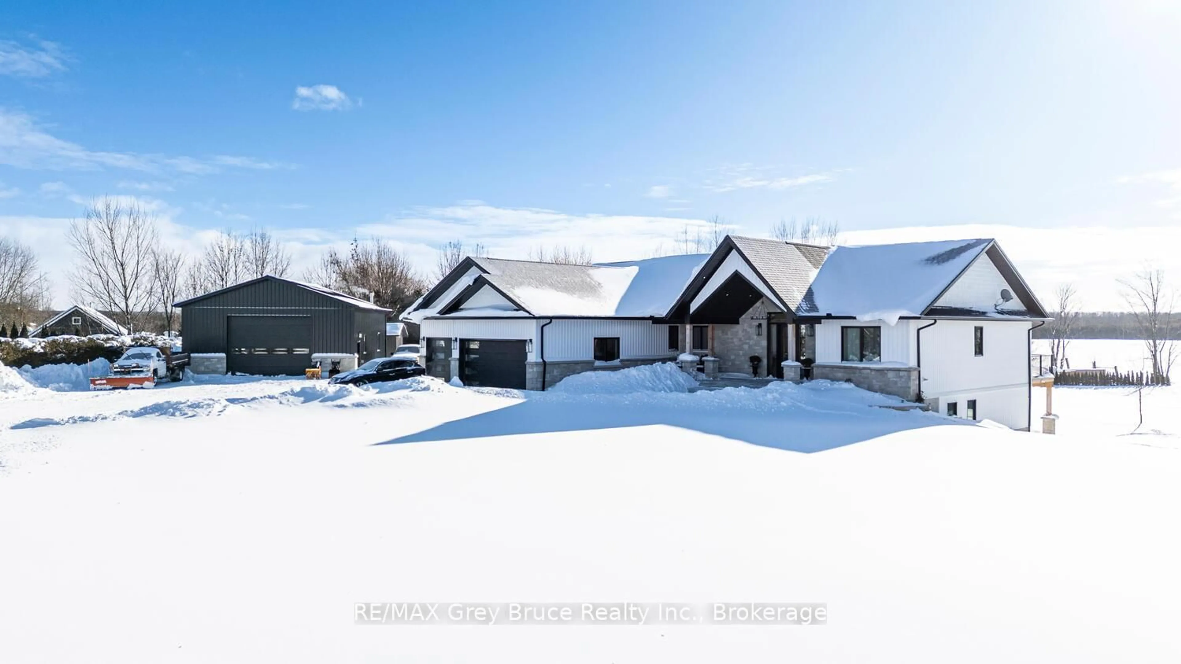 A pic from outside/outdoor area/front of a property/back of a property/a pic from drone, street for 117 Almur Dr, Georgian Bluffs Ontario N0H 2T0