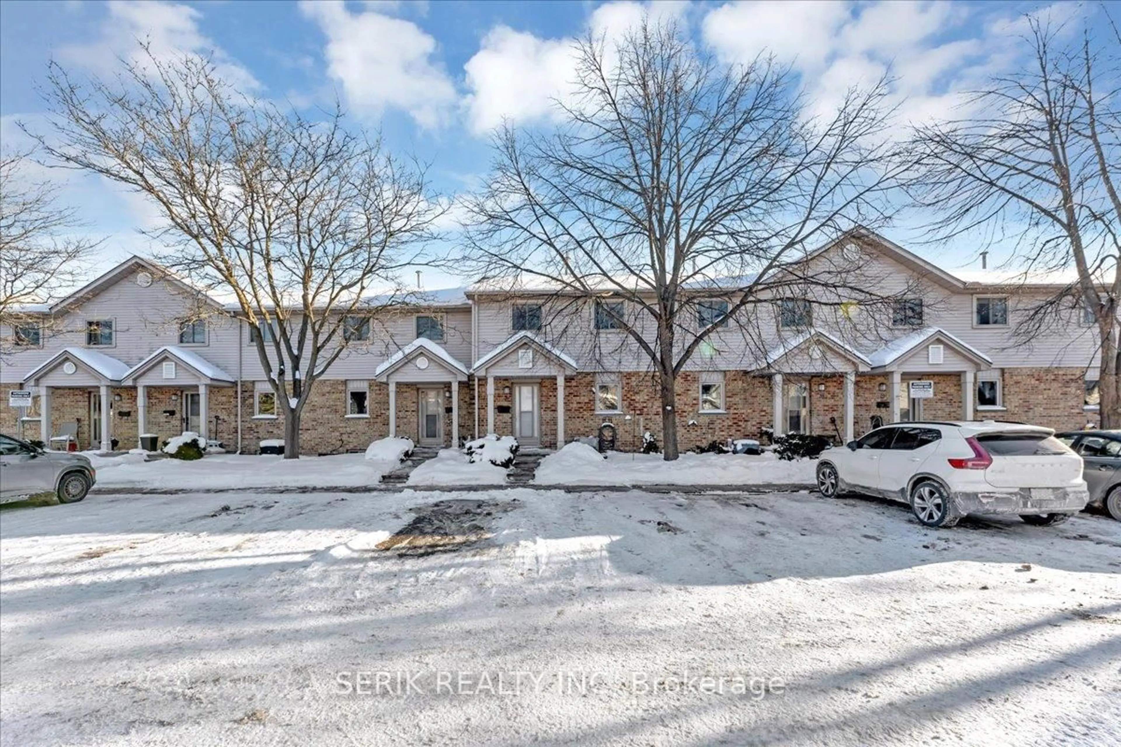 A pic from outside/outdoor area/front of a property/back of a property/a pic from drone, street for 217 Martinet Ave #17, London East Ontario N5V 4P5