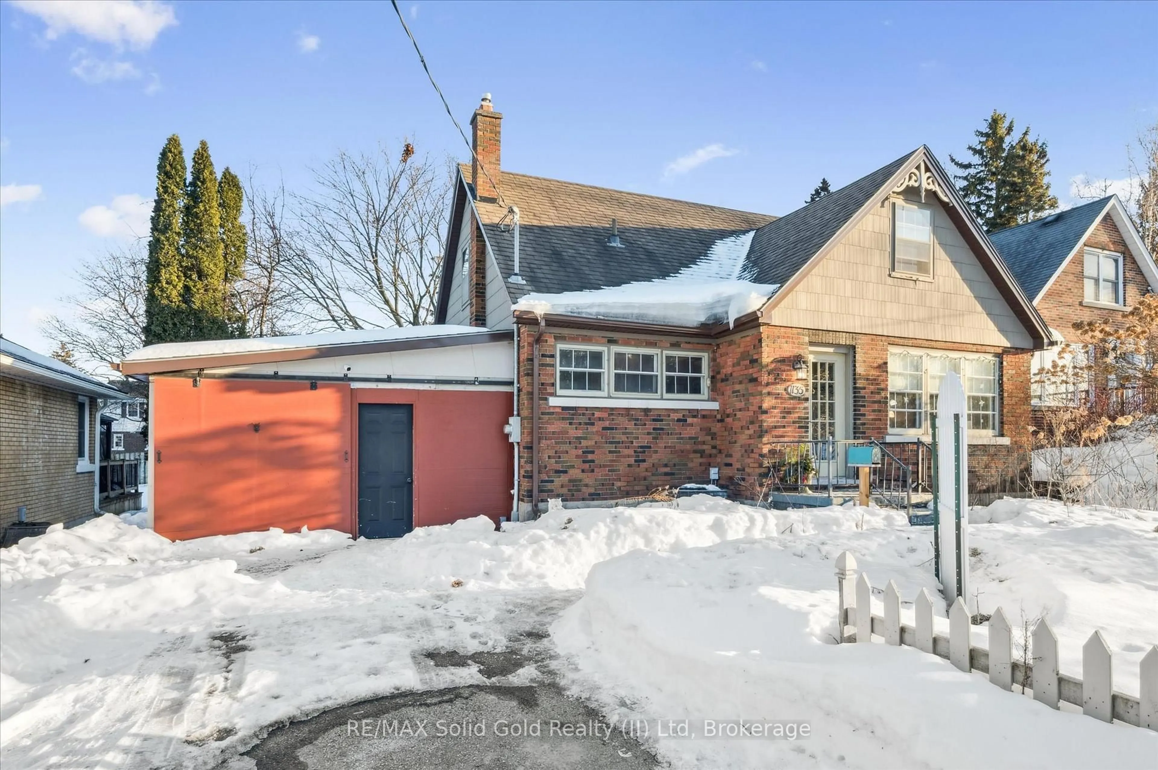 Home with brick exterior material, street for 1135 Queens Blvd, Kitchener Ontario N2M 1B9