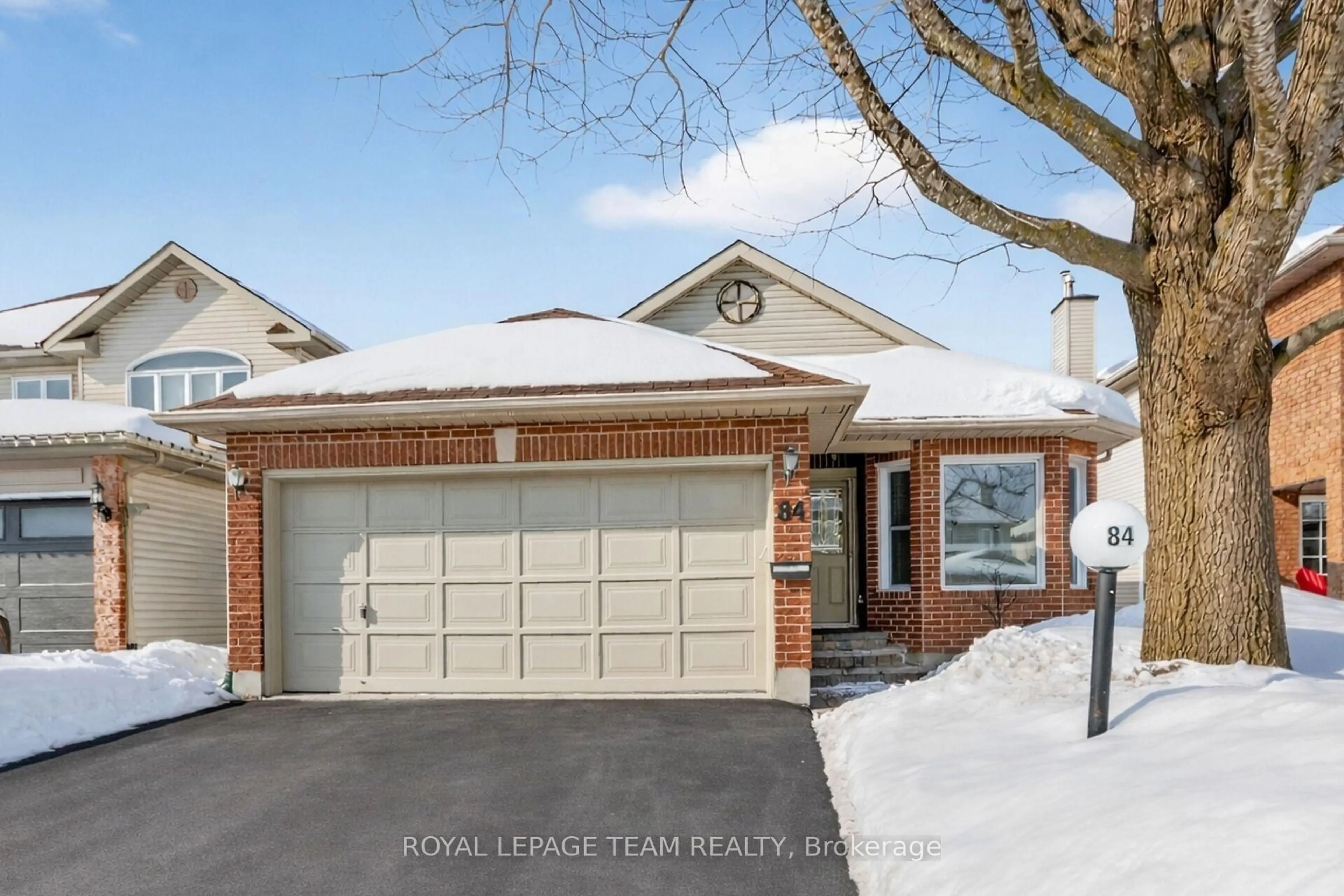 Home with brick exterior material, street for 84 Newborough Cres, Ottawa Ontario K2G 6A9