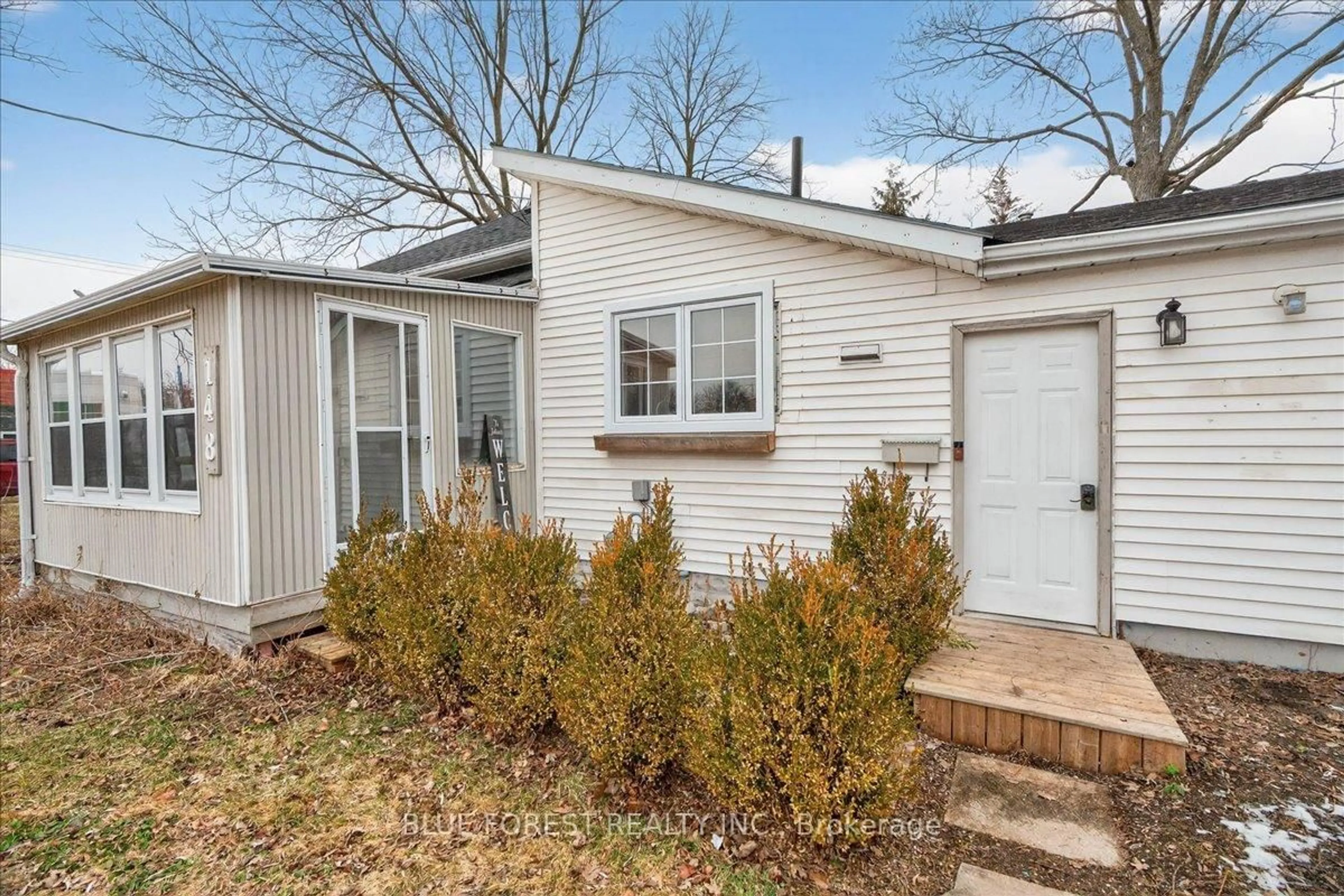 Home with vinyl exterior material, street for 148 Main St, West Elgin Ontario N0L 2P0