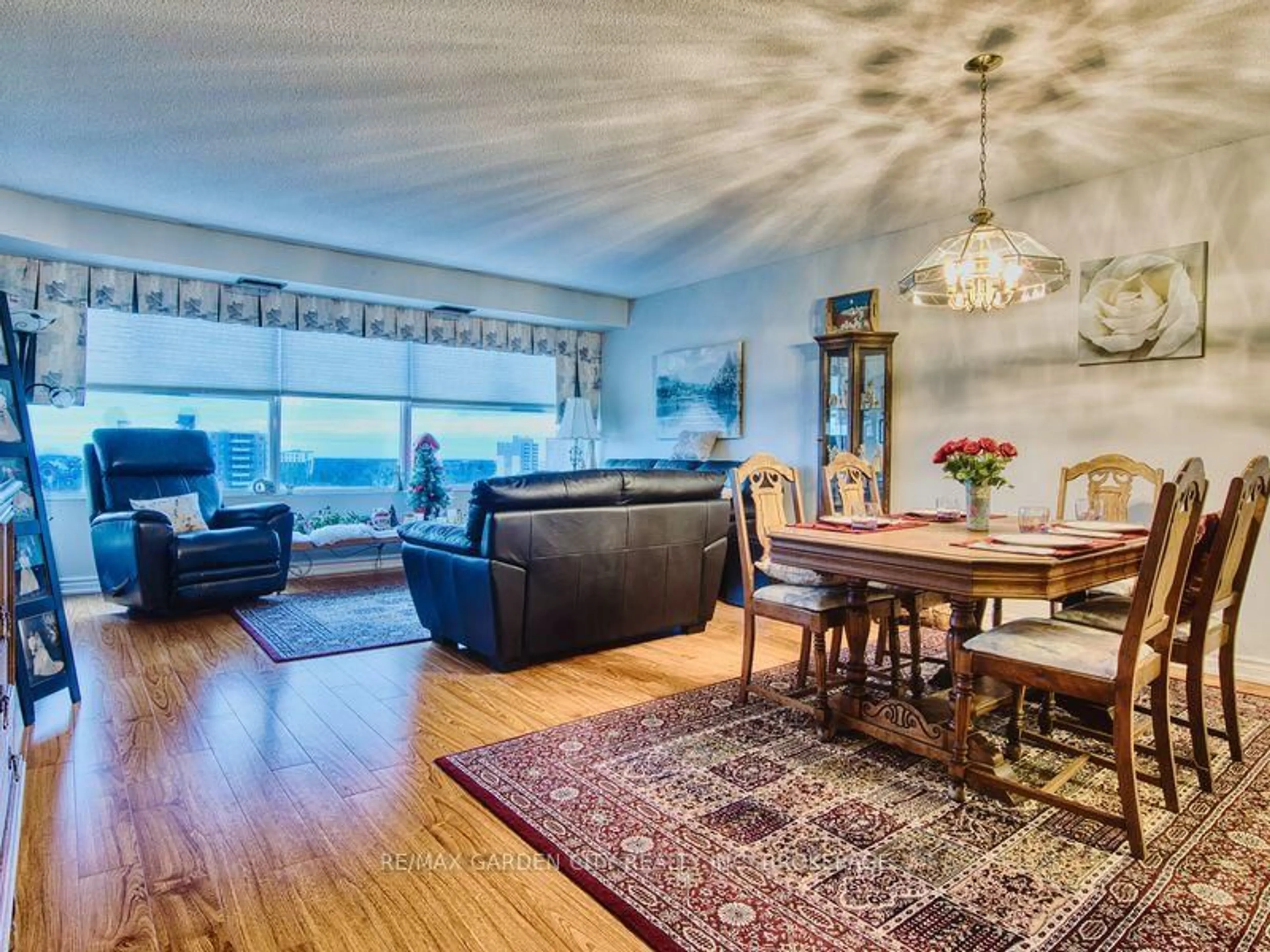 Living room with furniture, wood/laminate floor for 7 Gale Cres #1110, St. Catharines Ontario L2R 7M8