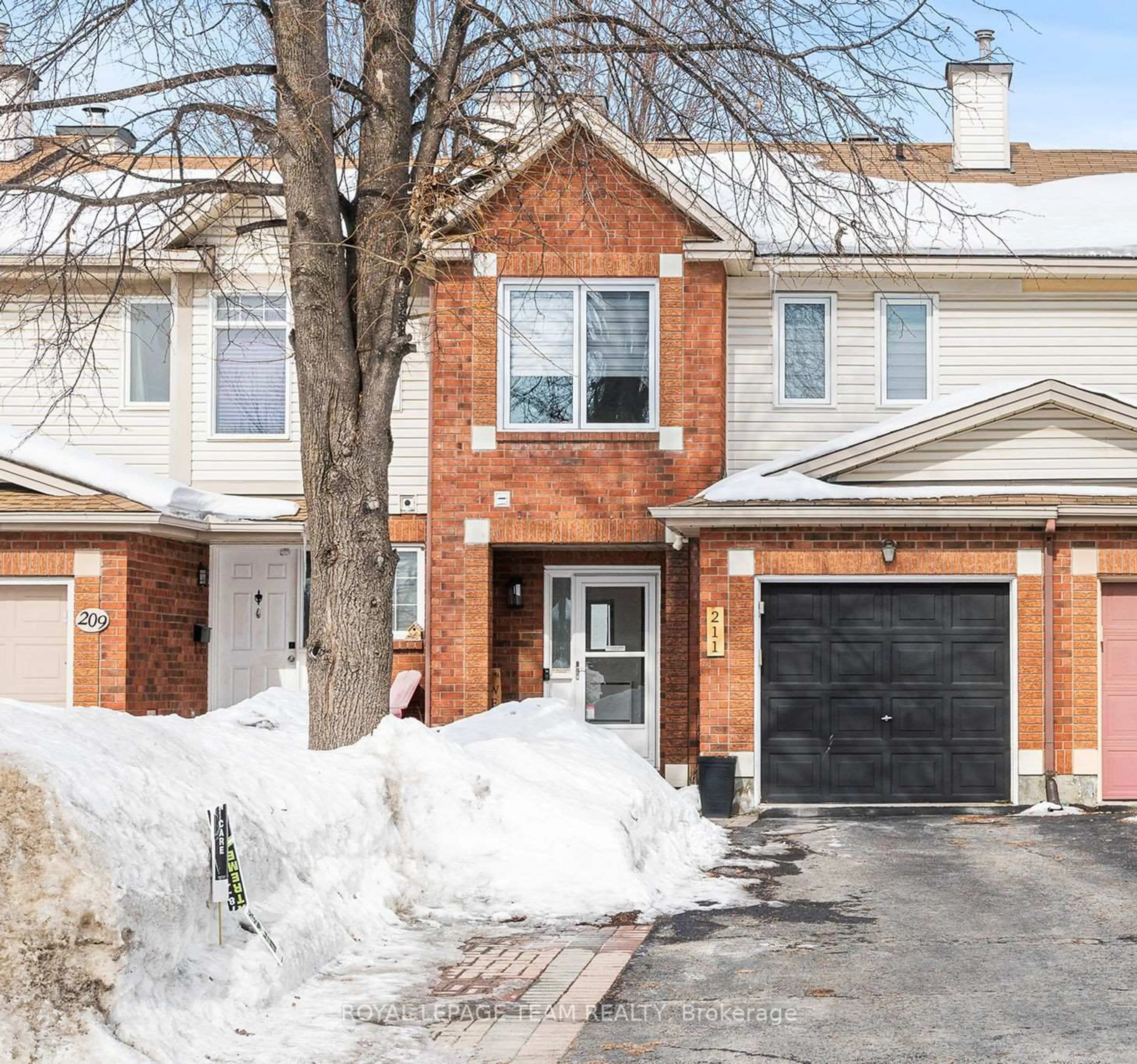Home with brick exterior material, street for 211 Longshire Circ, Ottawa Ontario K2J 4K8