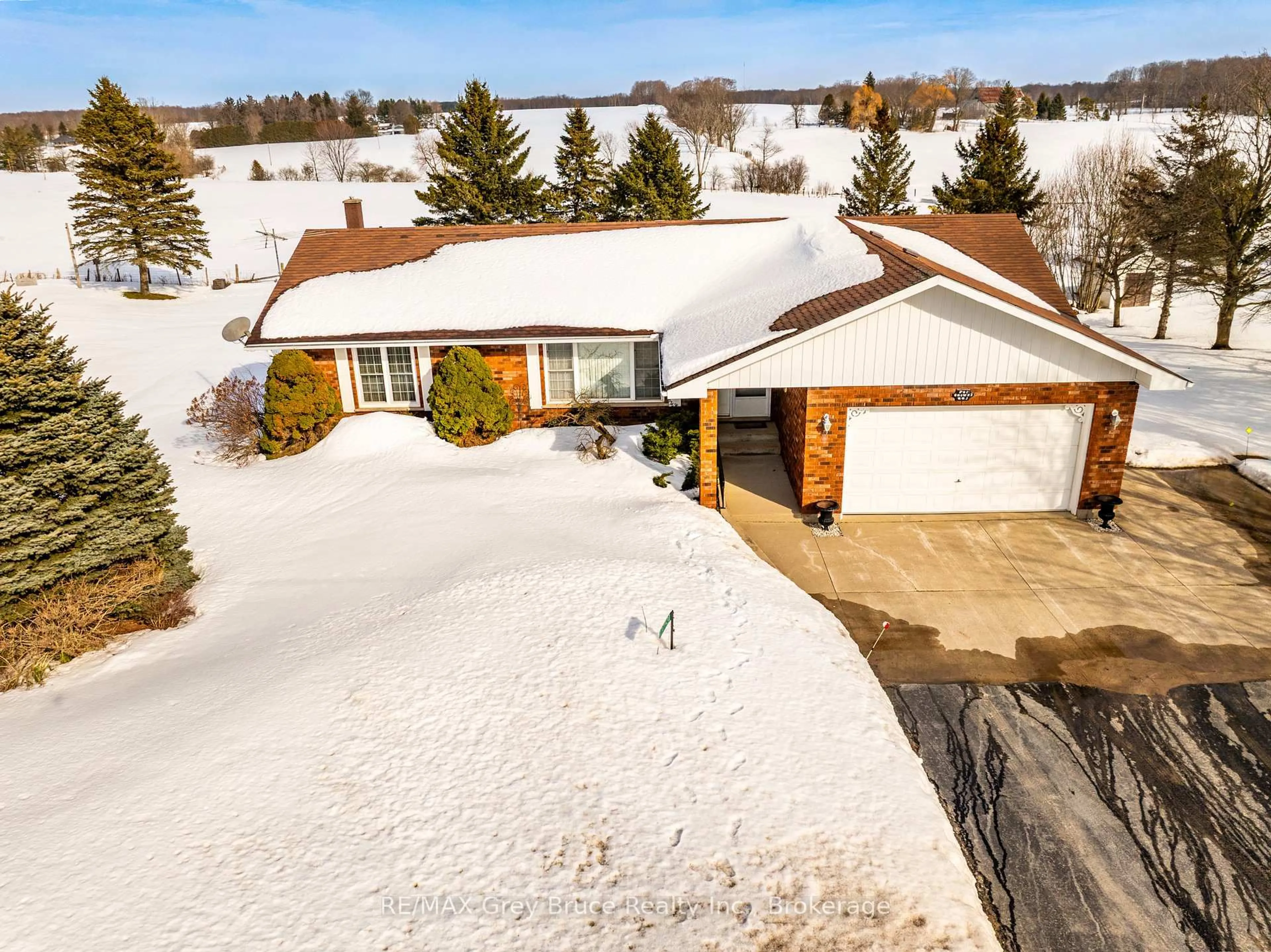 A pic from outside/outdoor area/front of a property/back of a property/a pic from drone, street for 137531 7th Concession, Georgian Bluffs Ontario N4K 5N5