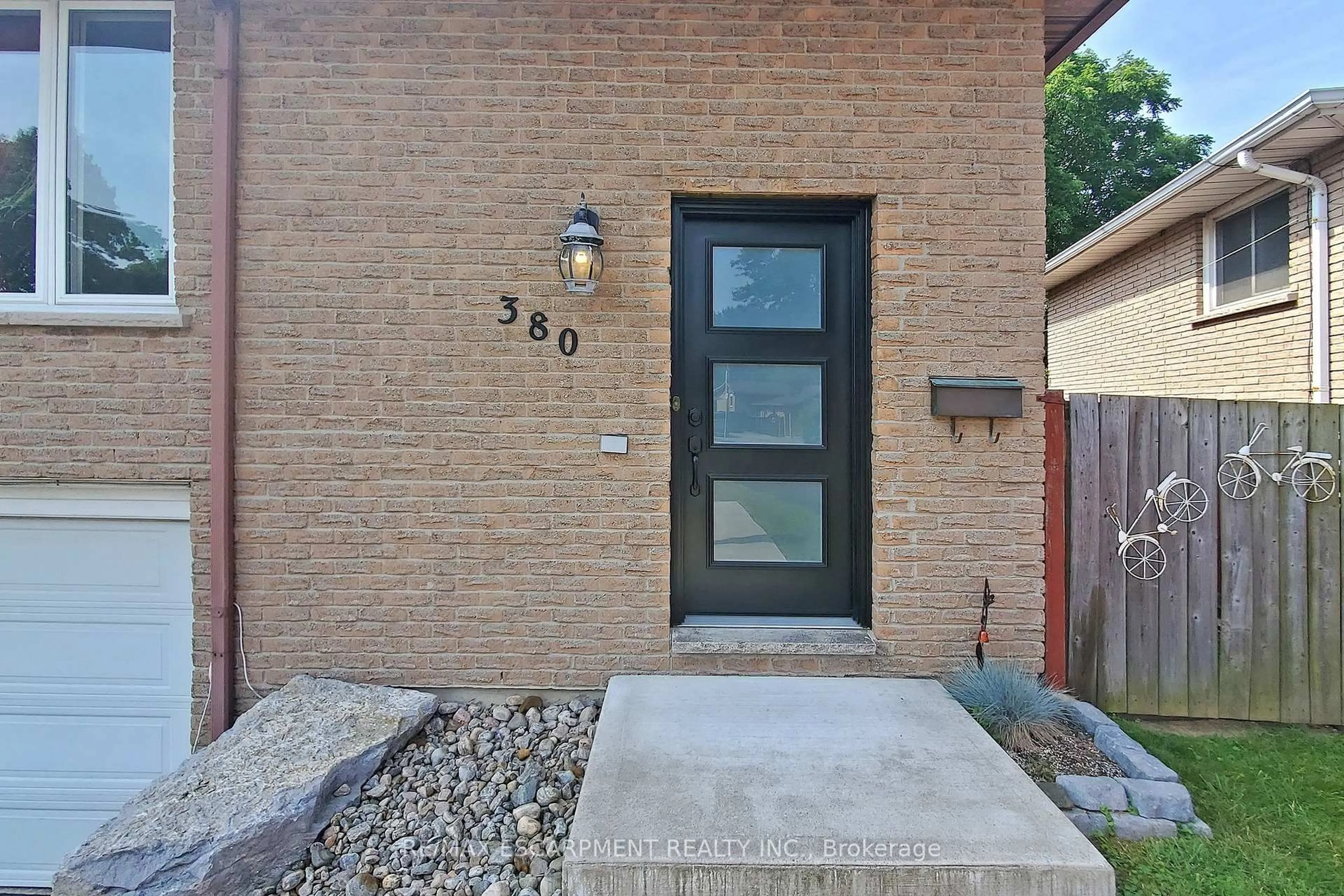Home with brick exterior material, street for 380 Magnolia Dr, Hamilton Ontario L9C 6N7