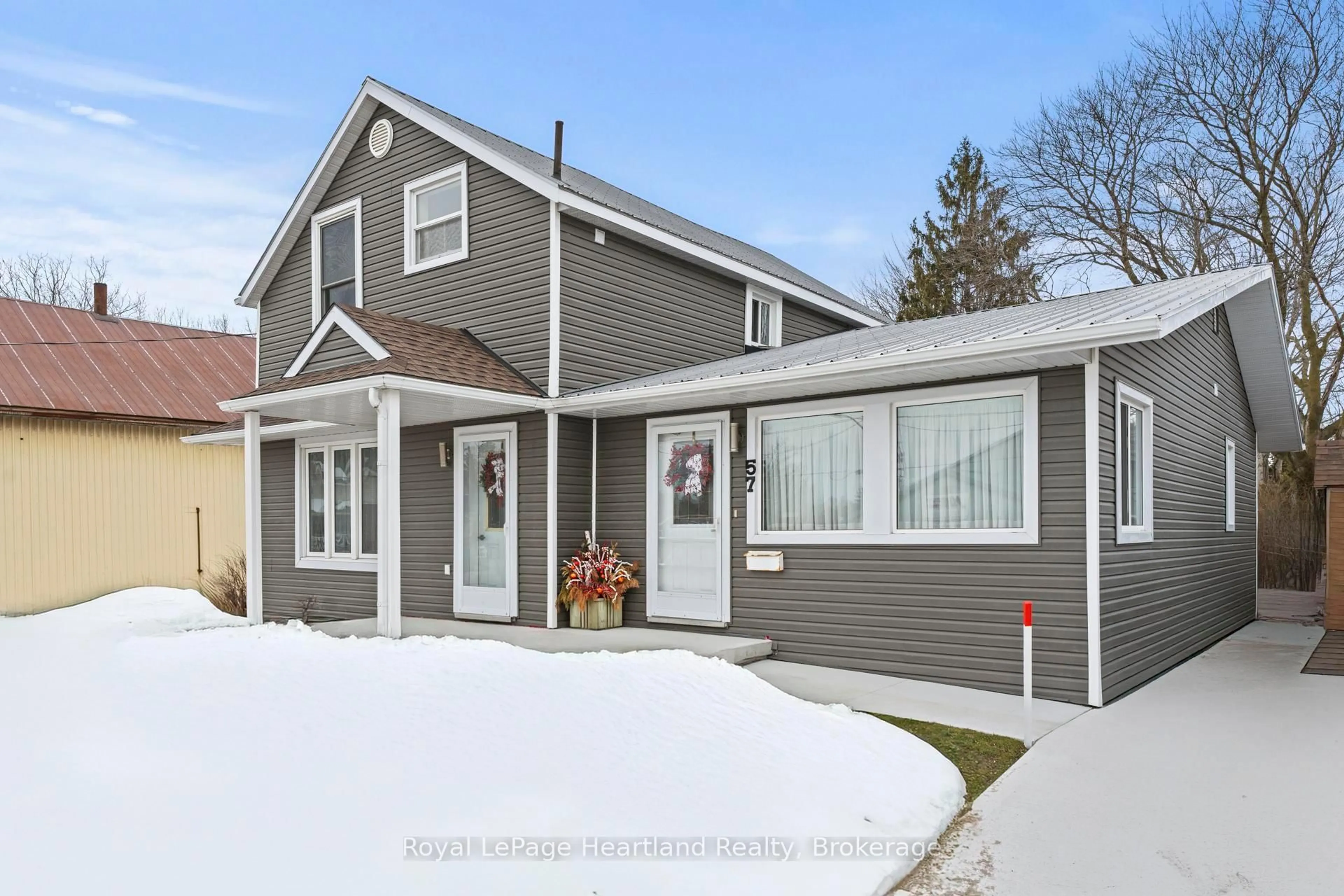 Home with vinyl exterior material, street for 57 Huron St, Central Huron Ontario N0M 1L0