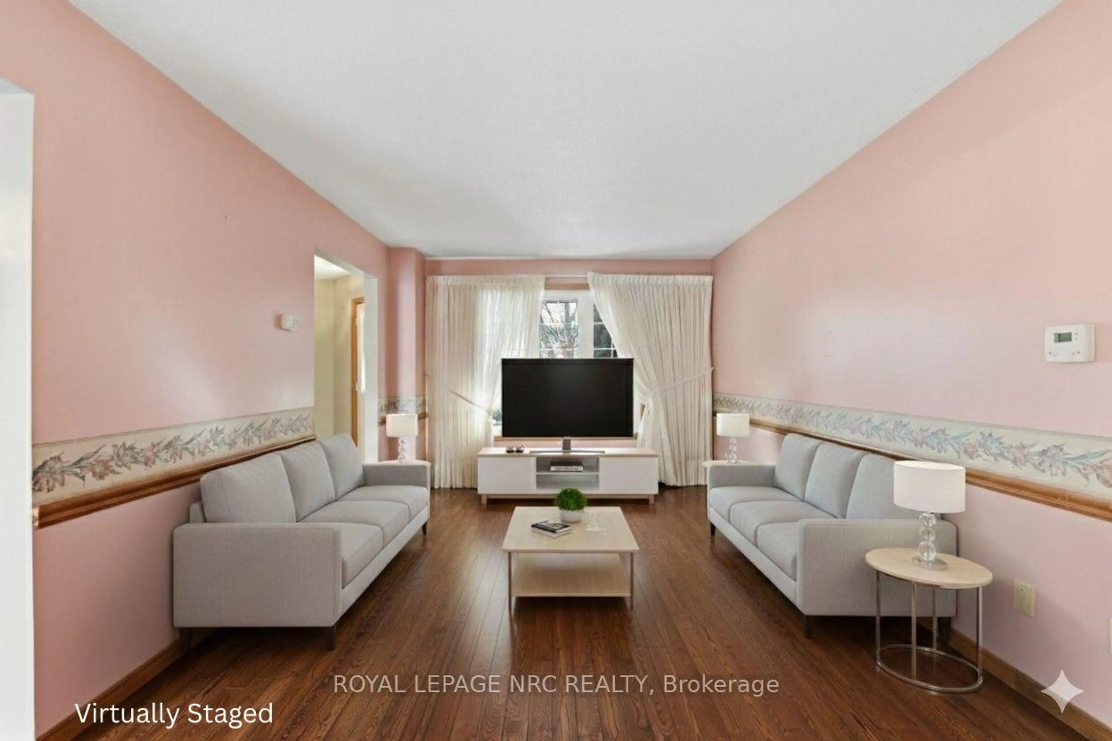 Living room with furniture, wood/laminate floor for 107 Butler Dr, Hamilton Ontario L8W 3K2