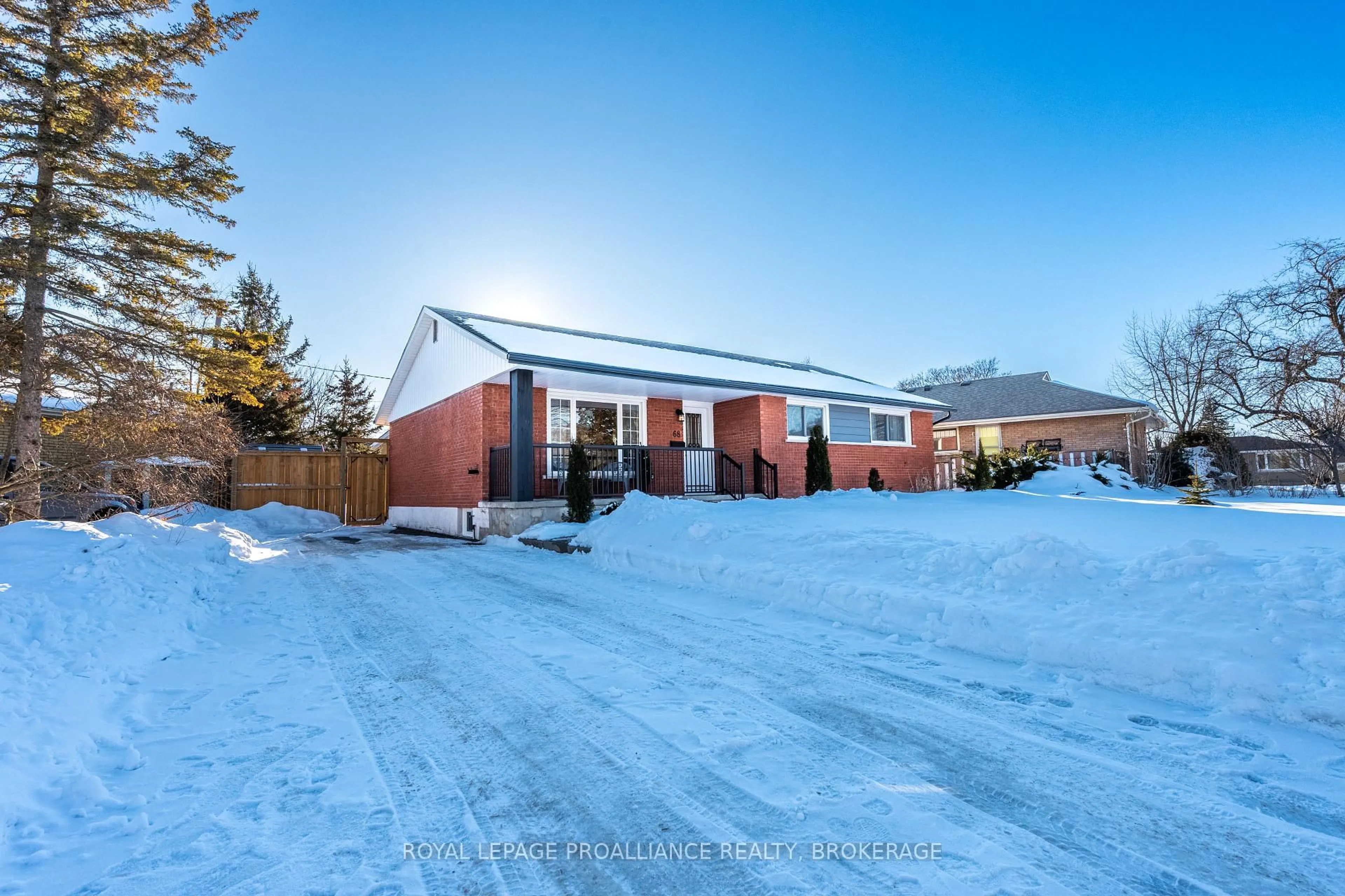 A pic from outside/outdoor area/front of a property/back of a property/a pic from drone, street for 68 Mackenzie Cres, Kingston Ontario K7M 2S1