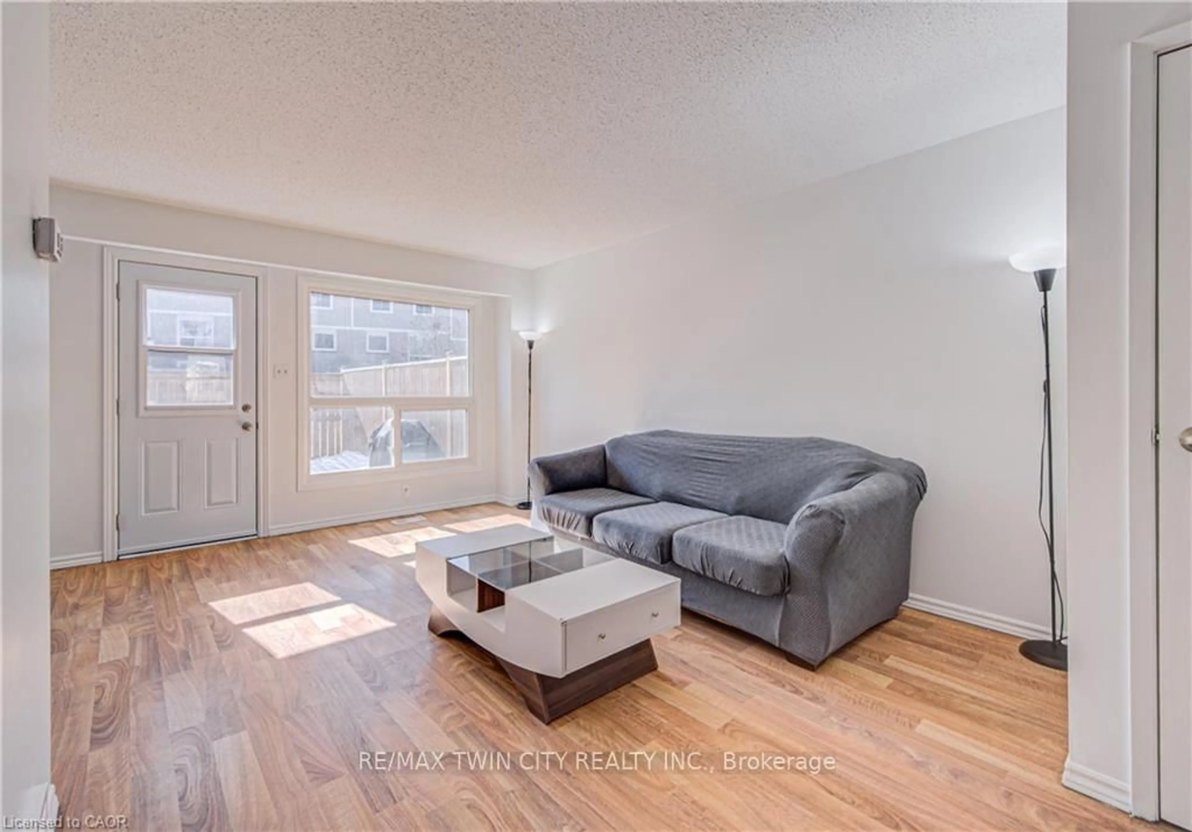 Living room with furniture, wood/laminate floor for 277 PIONEER Dr, Kitchener Ontario N2P 1M9