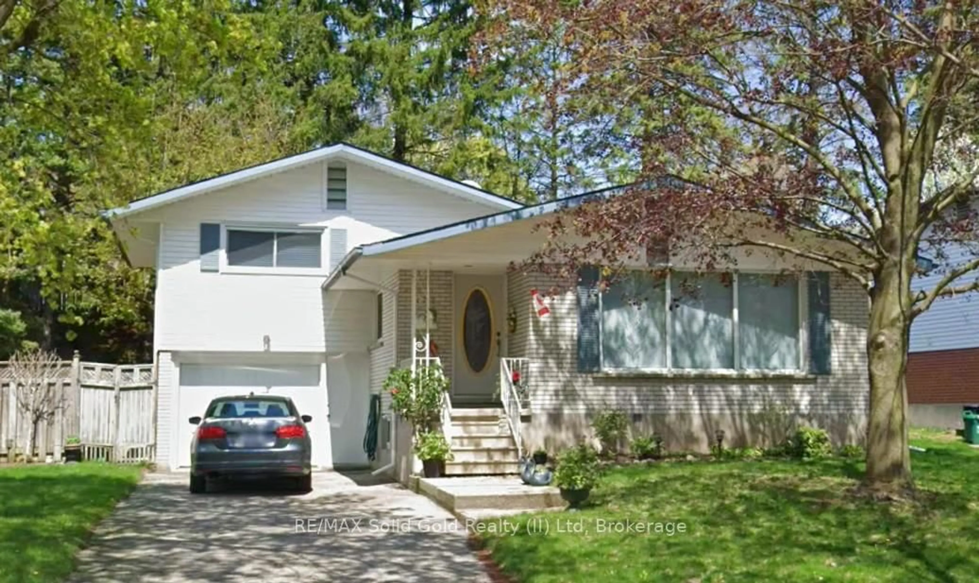 Home with vinyl exterior material, street for 132 Forest Hill Dr, Kitchener Ontario N2M 4G3