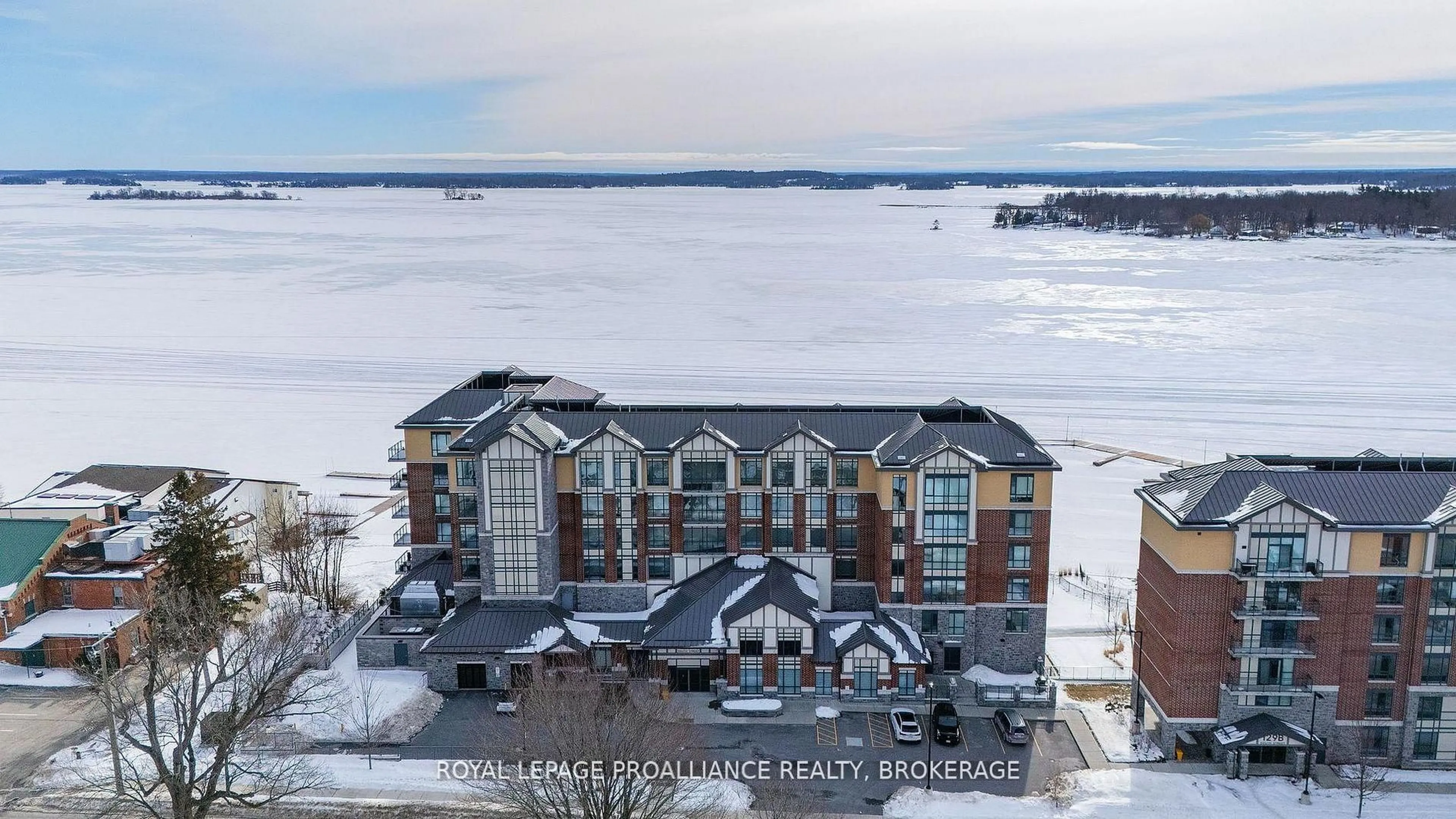 A pic from outside/outdoor area/front of a property/back of a property/a pic from drone, water/lake/river/ocean view for 129A South St #410, Gananoque Ontario K7G 0A9